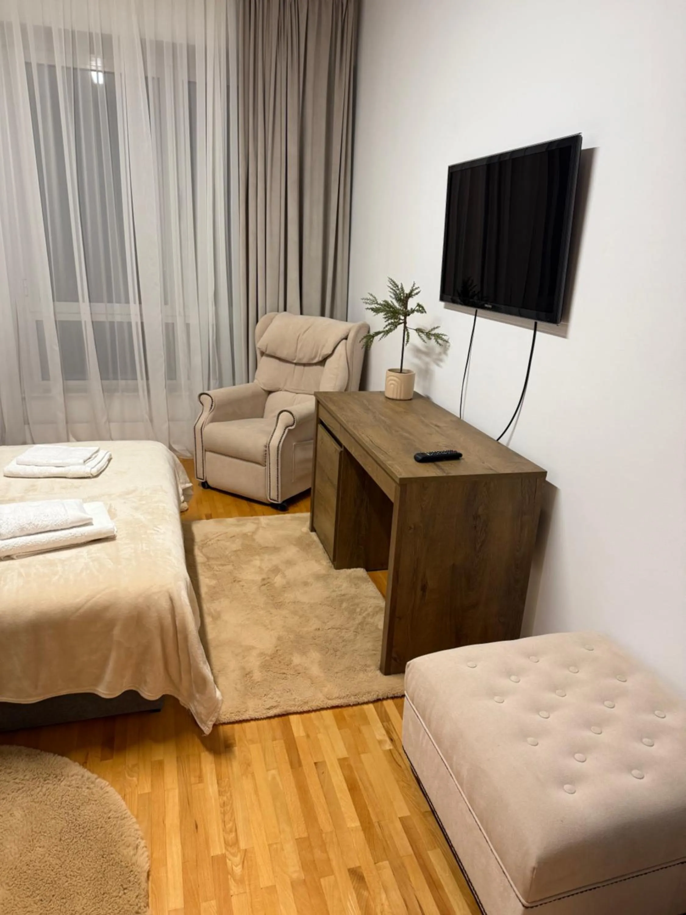 Bed in Muha ApartHotel