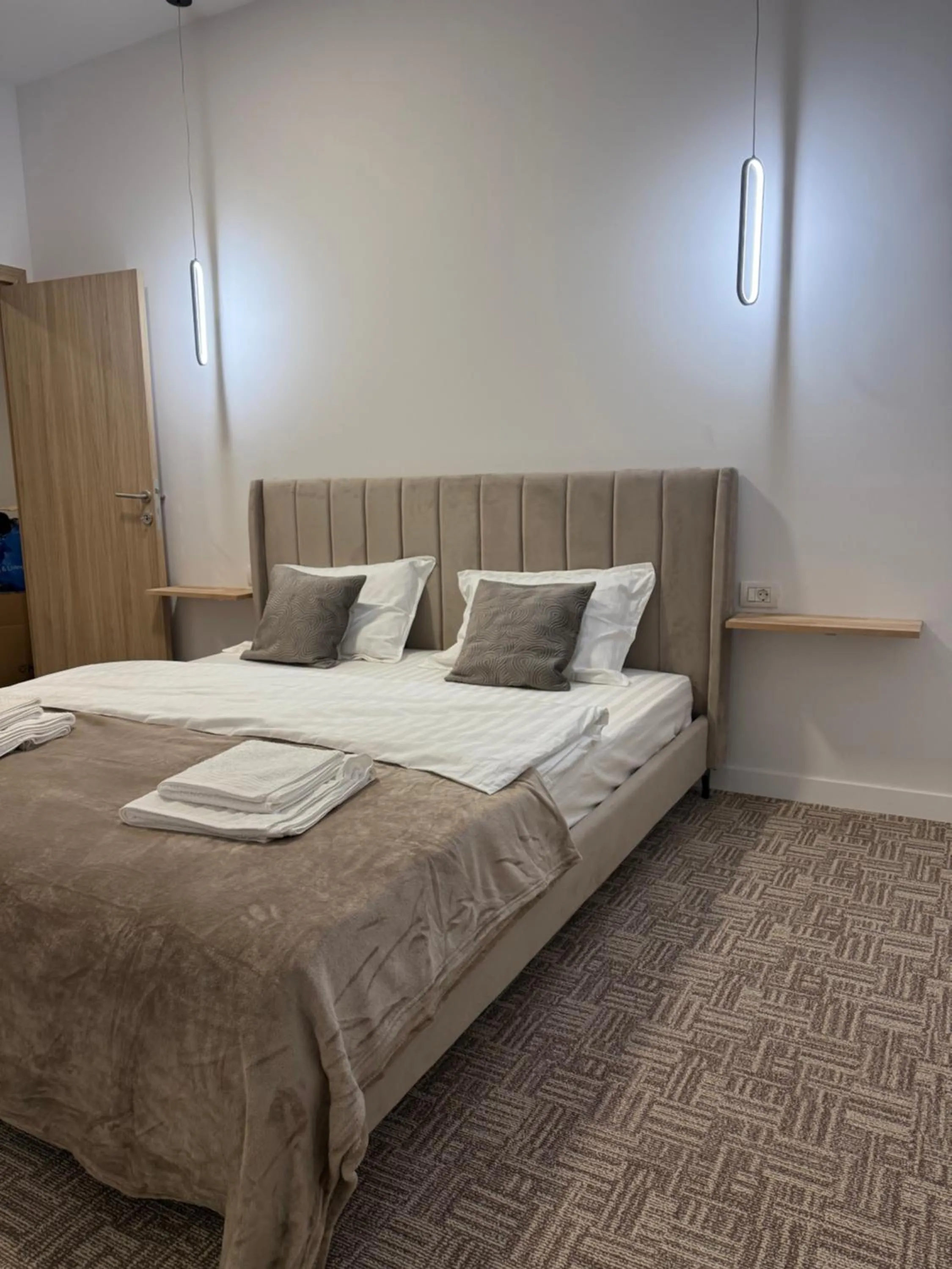 Bed in Muha ApartHotel
