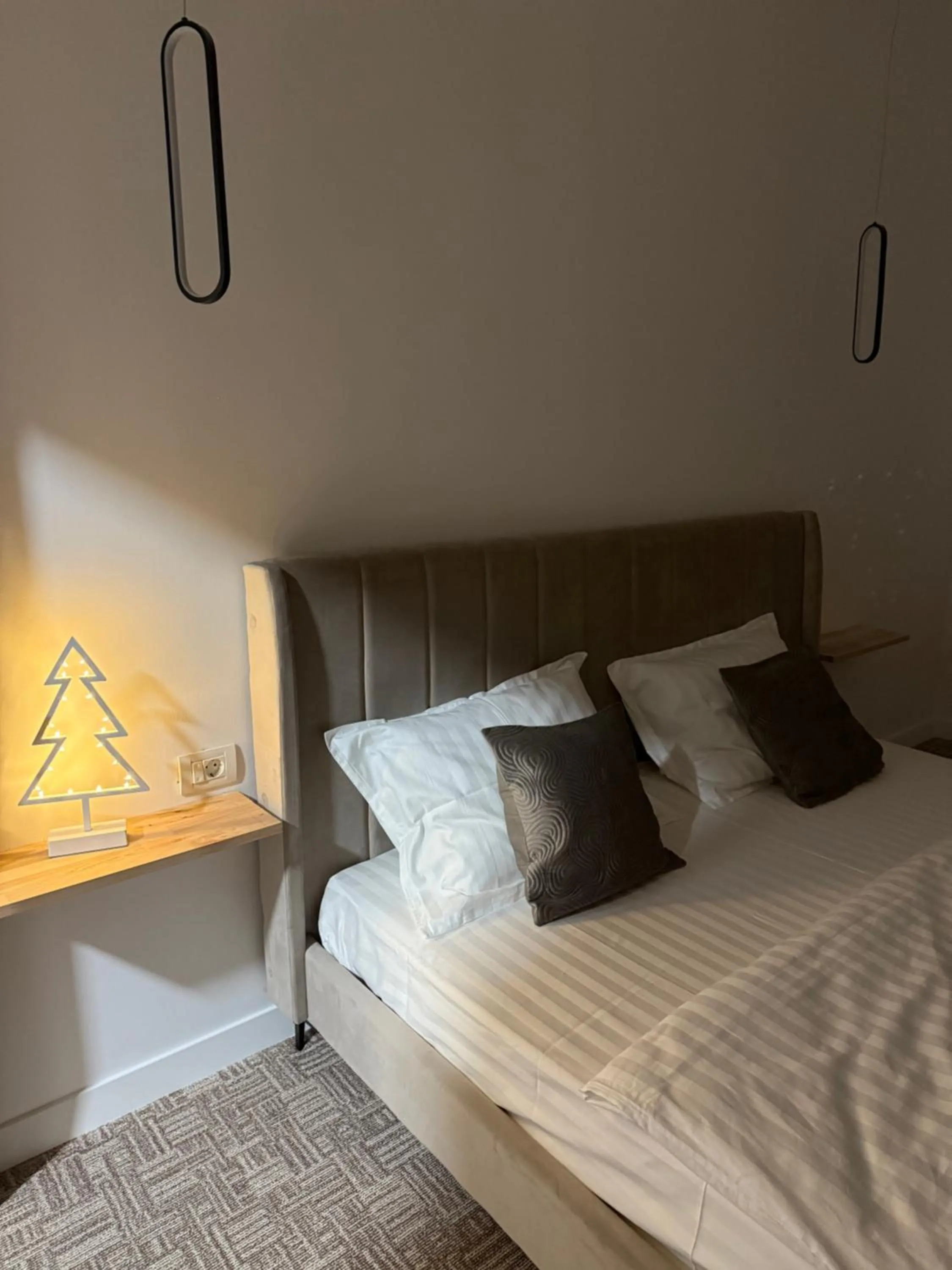 Bed in Muha ApartHotel