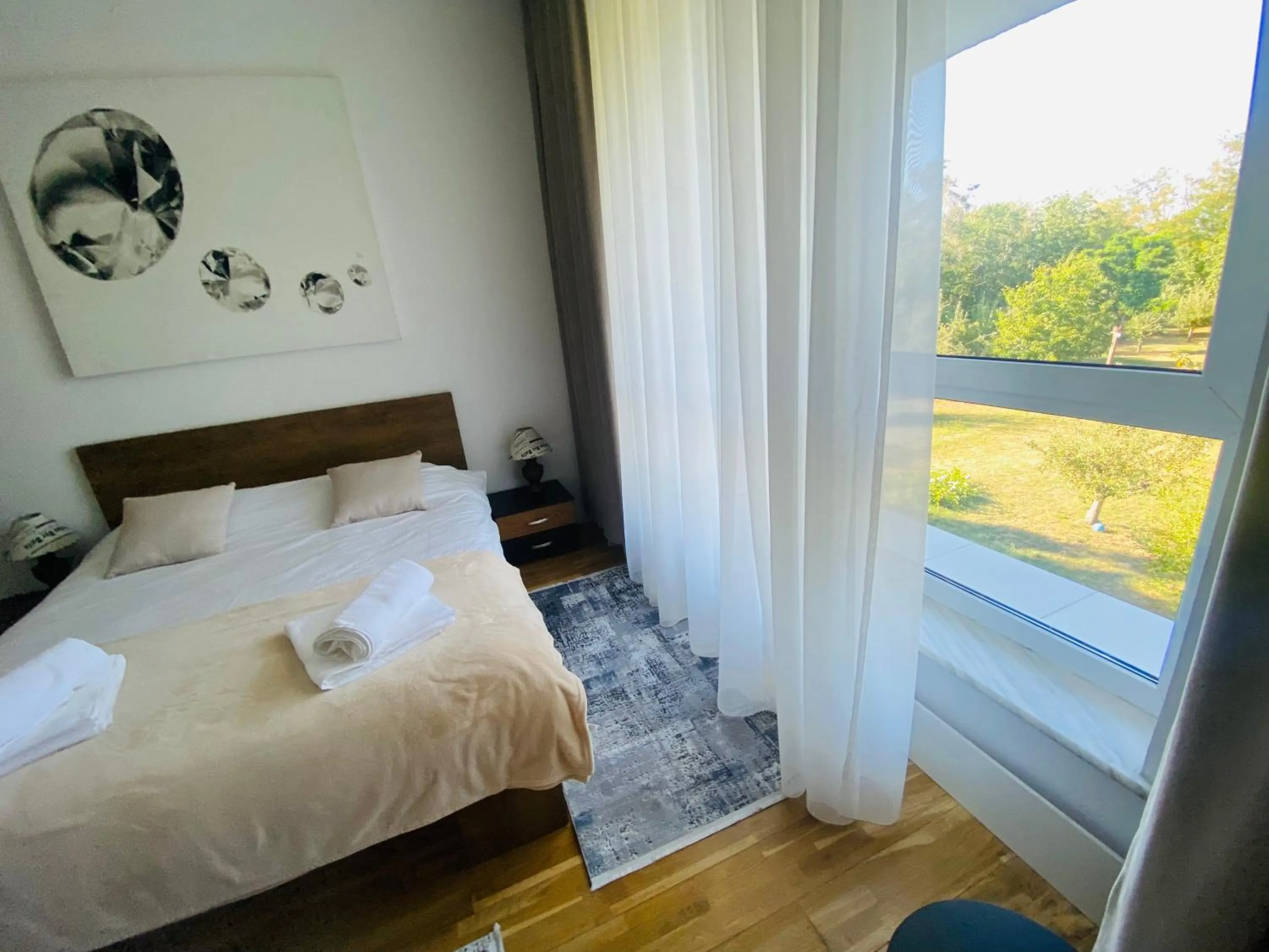 Bed in Muha ApartHotel