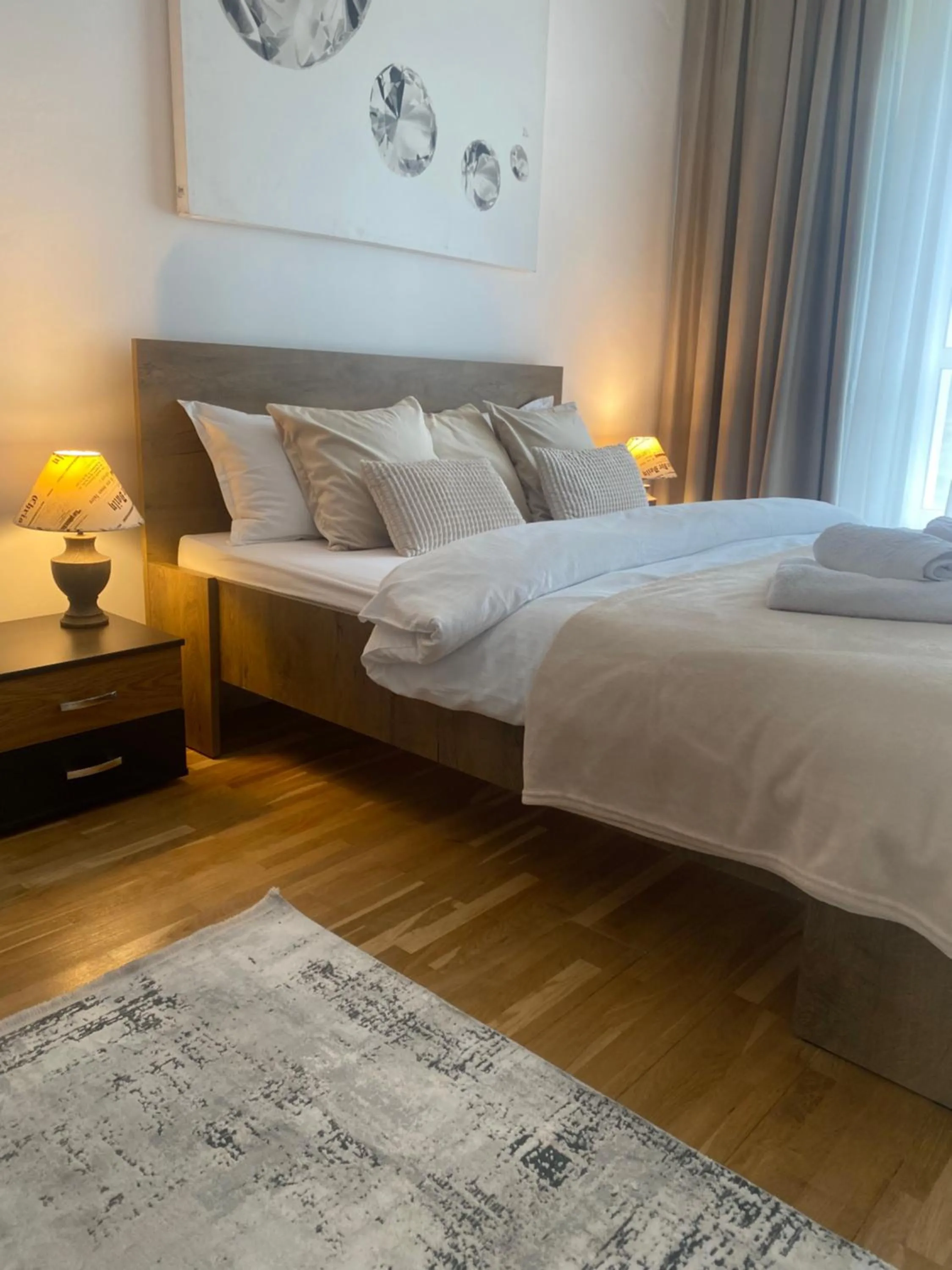 Bed in Muha ApartHotel