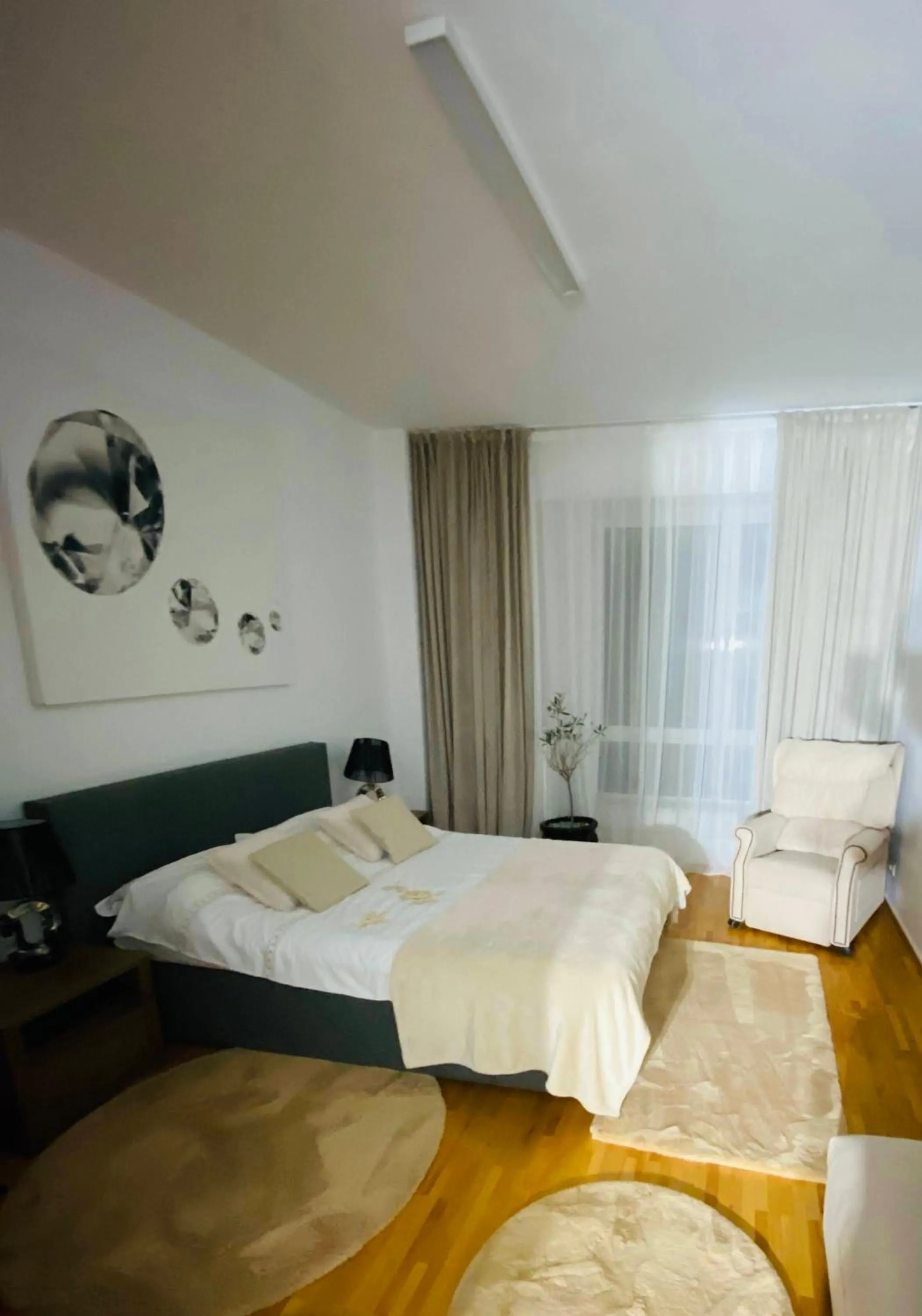 Bed in Muha ApartHotel