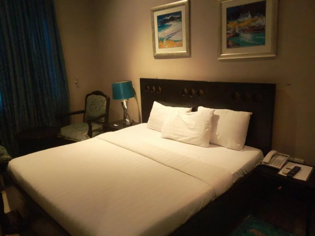 Bed in Villa Angelia Boutique Hotel