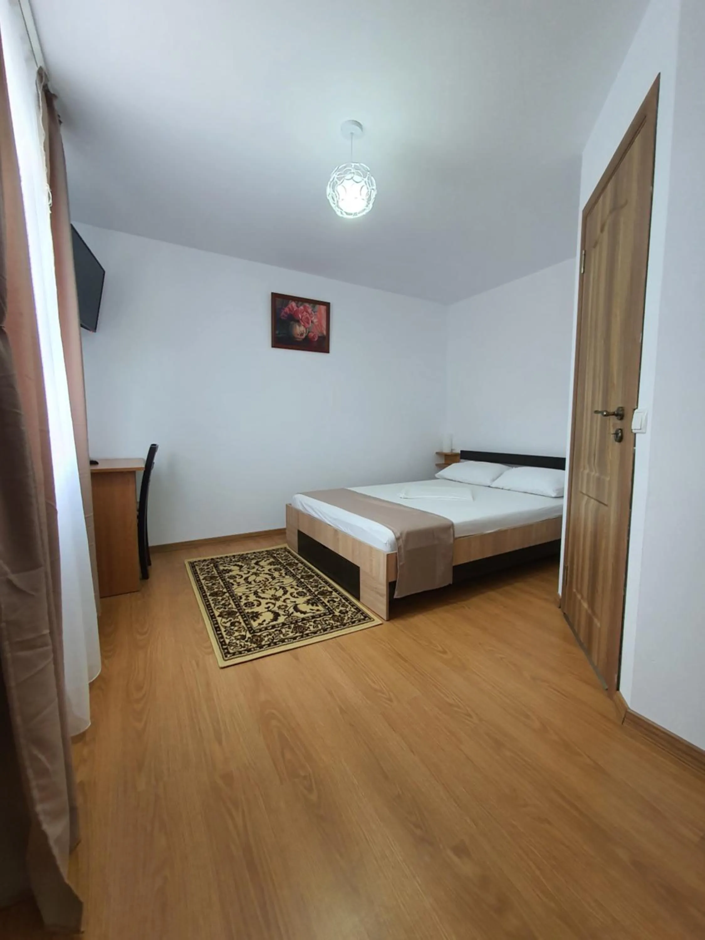 Bed in Pensiunea Stan