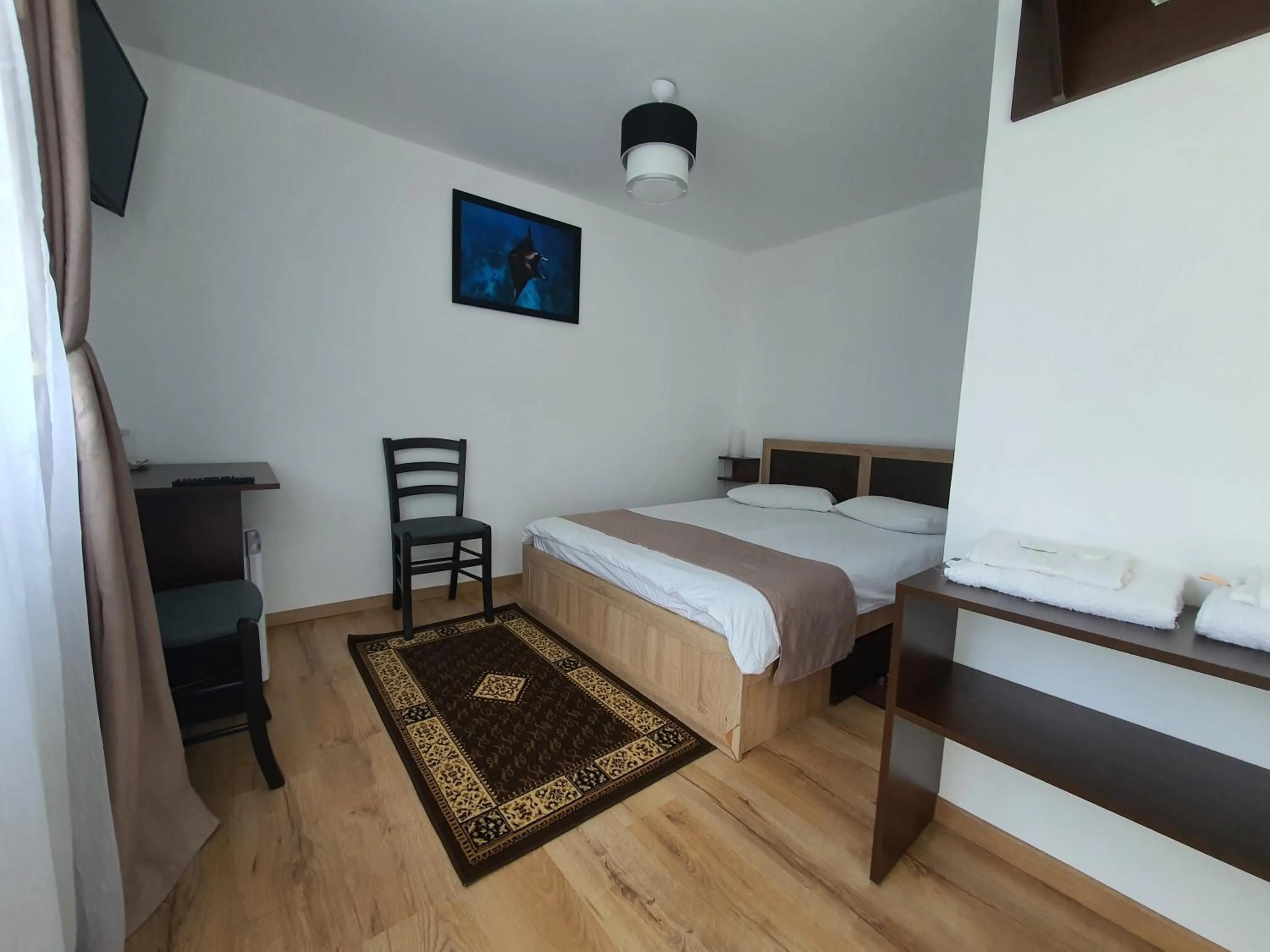 Photo of the whole room, Bed in Pensiunea Stan