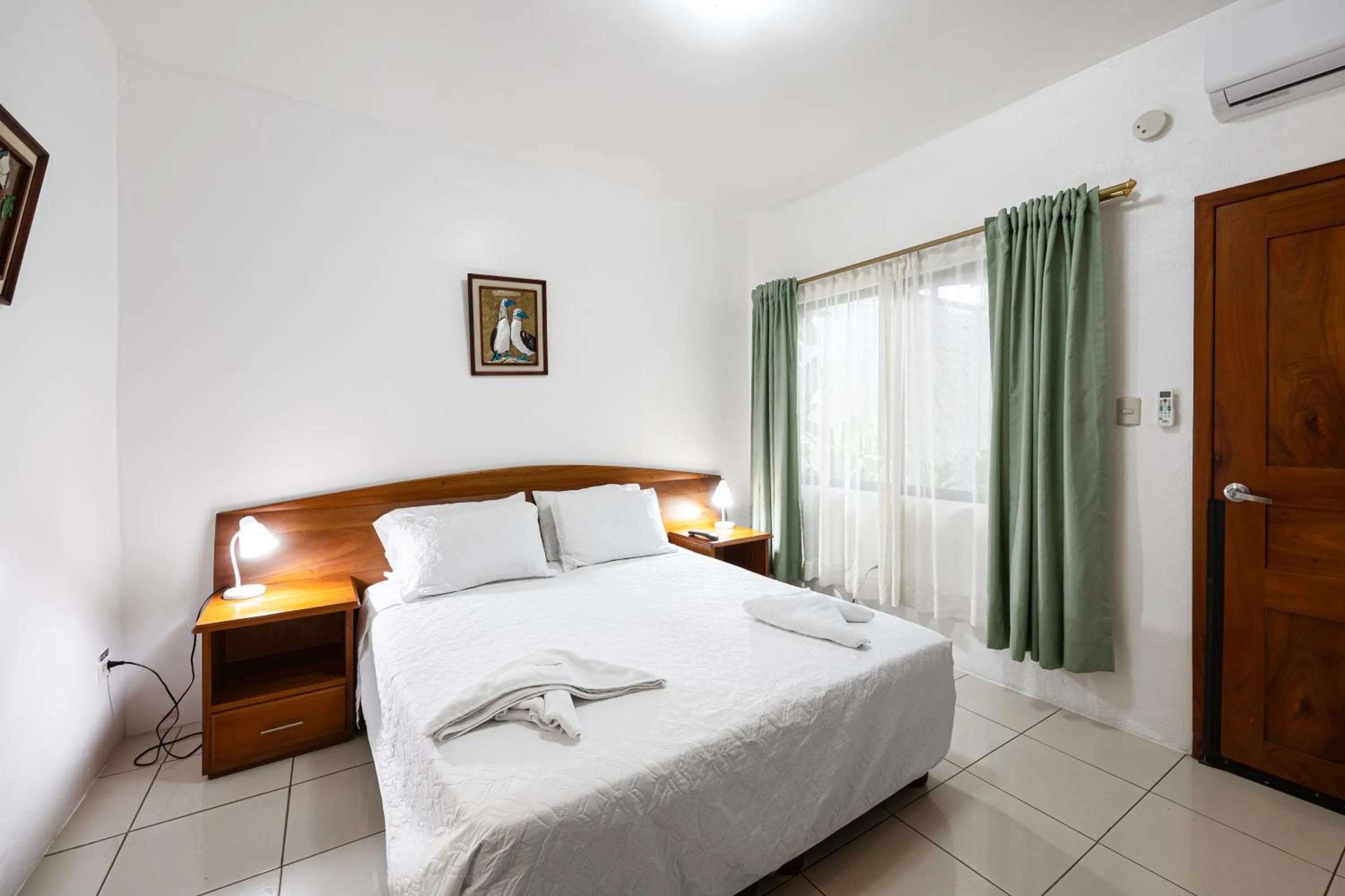 Bed in La Peregrina Galapagos B&B