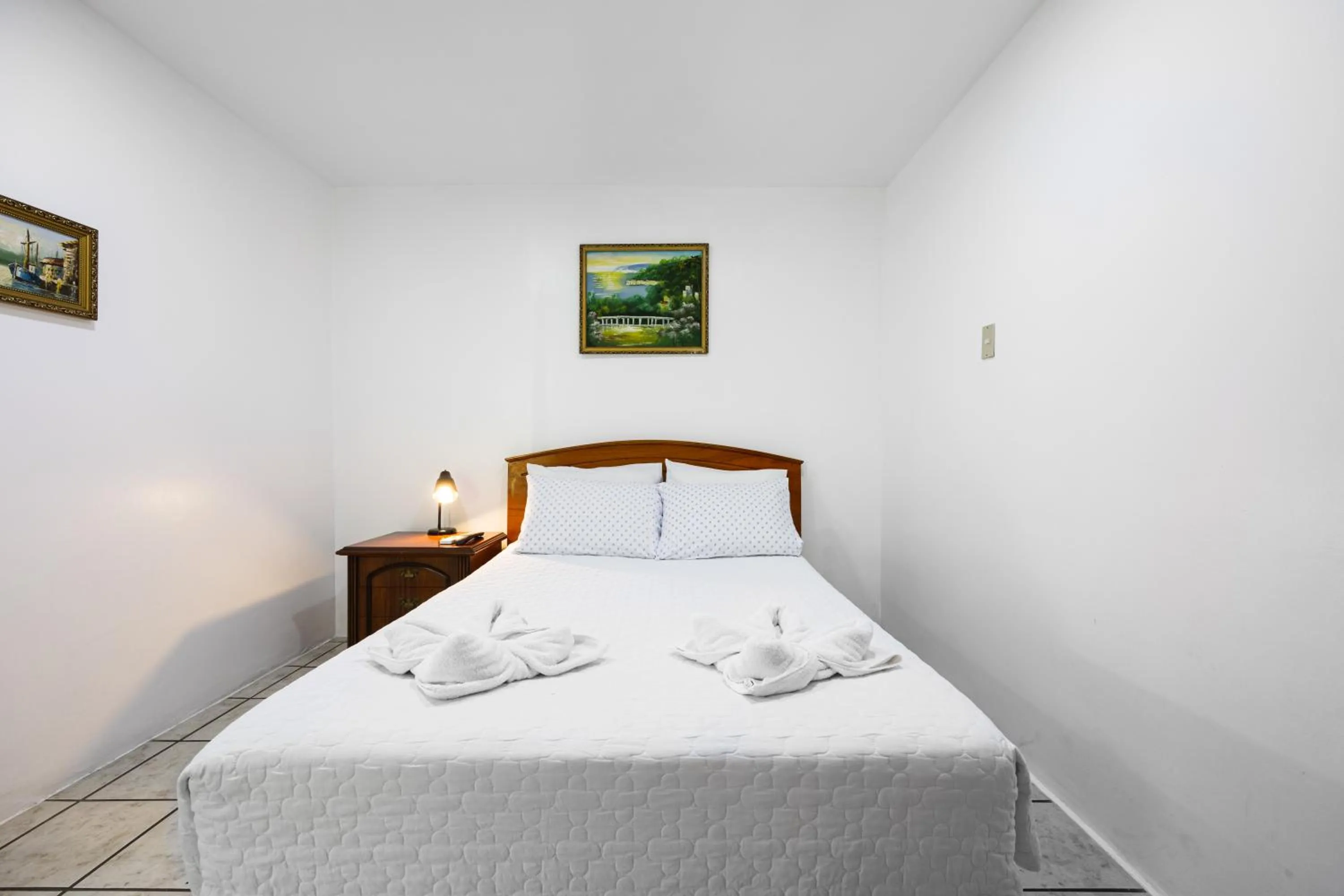 Bed in La Peregrina Galapagos B&B