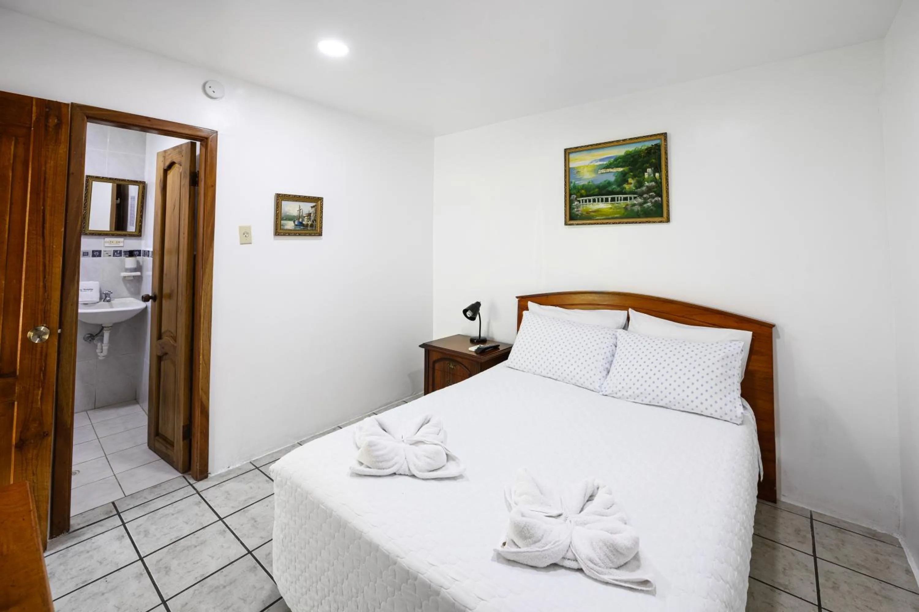 Bed in La Peregrina Galapagos B&B