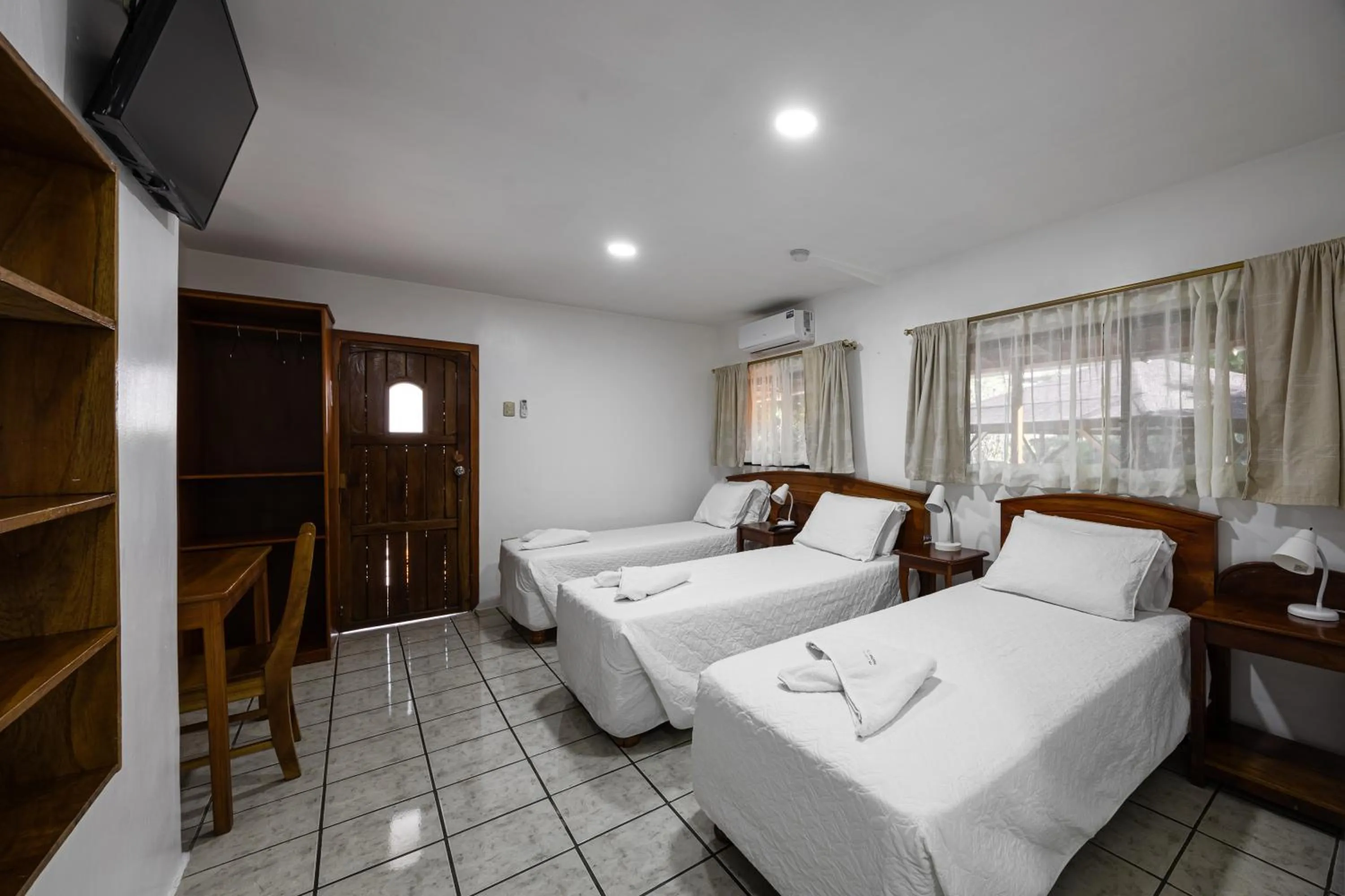 Bed in La Peregrina Galapagos B&B