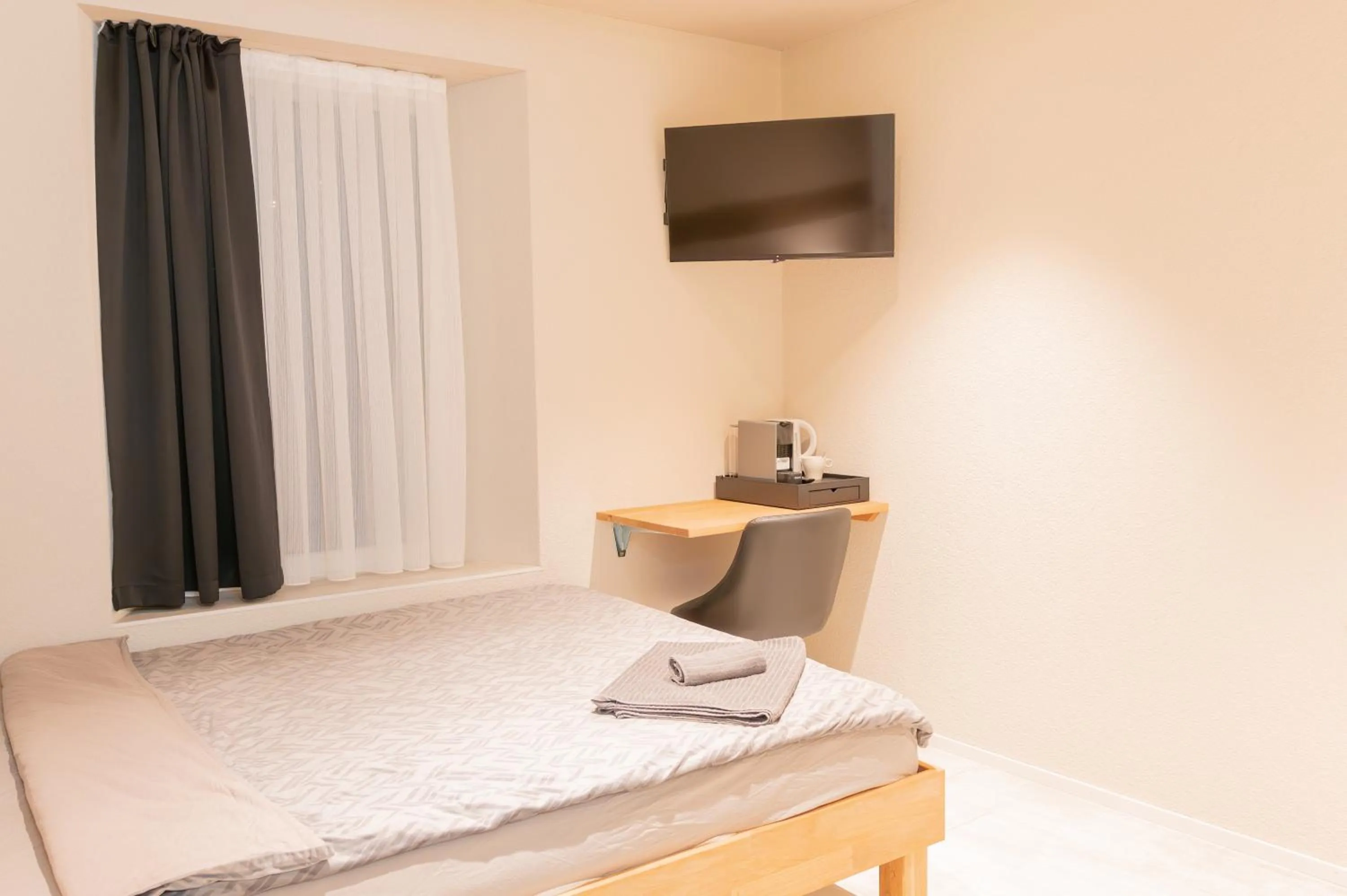 Bed in Hotel Rütli am Bahnhof Rüti ZH