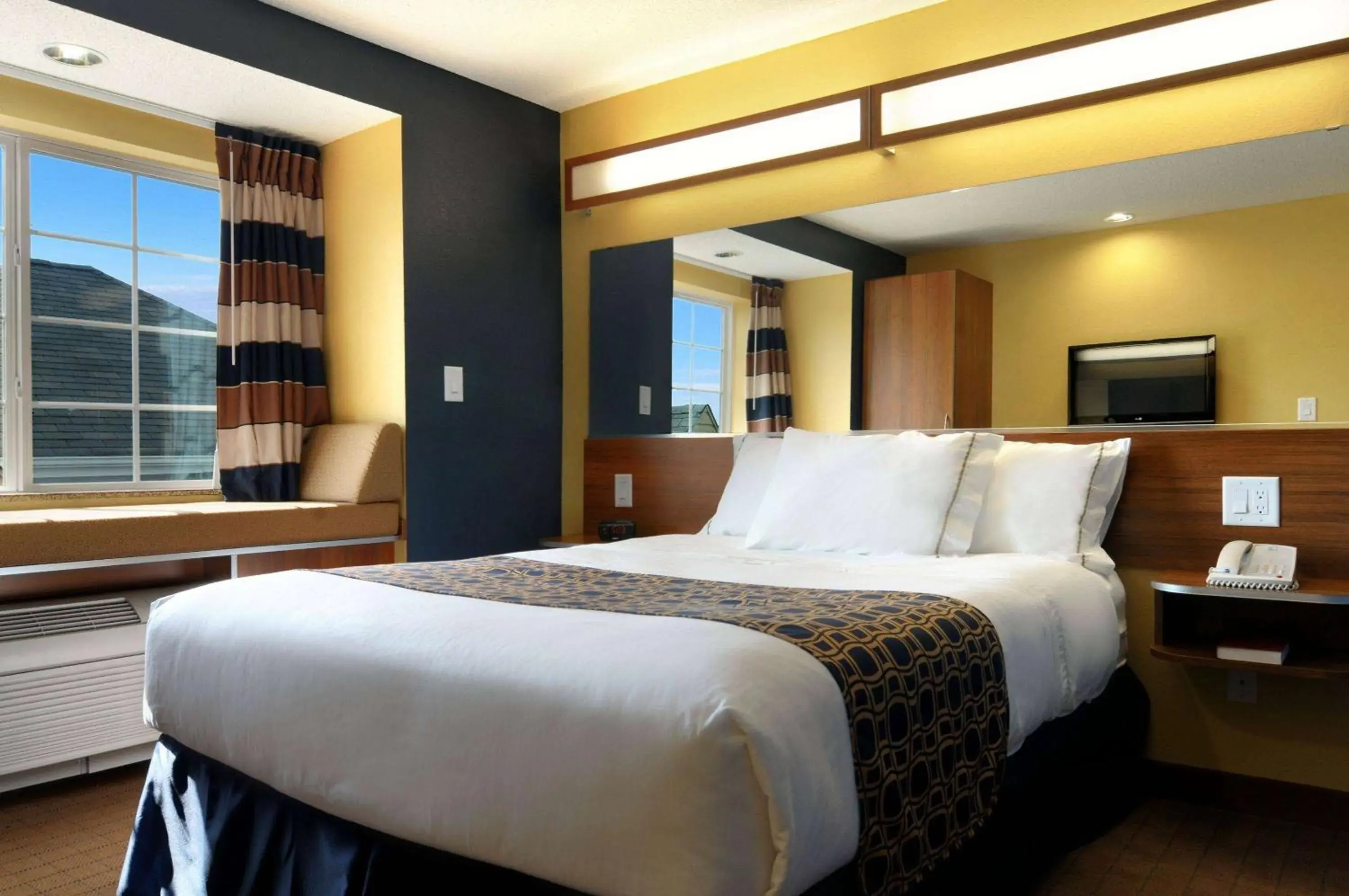 Photo of the whole room, Bed in Microtel Inn & Suites by Wyndham Columbus Near Fort Moore Photo of the whole room, Bed in Microtel Inn & Suites by Wyndham Columbus Near Fort Moore