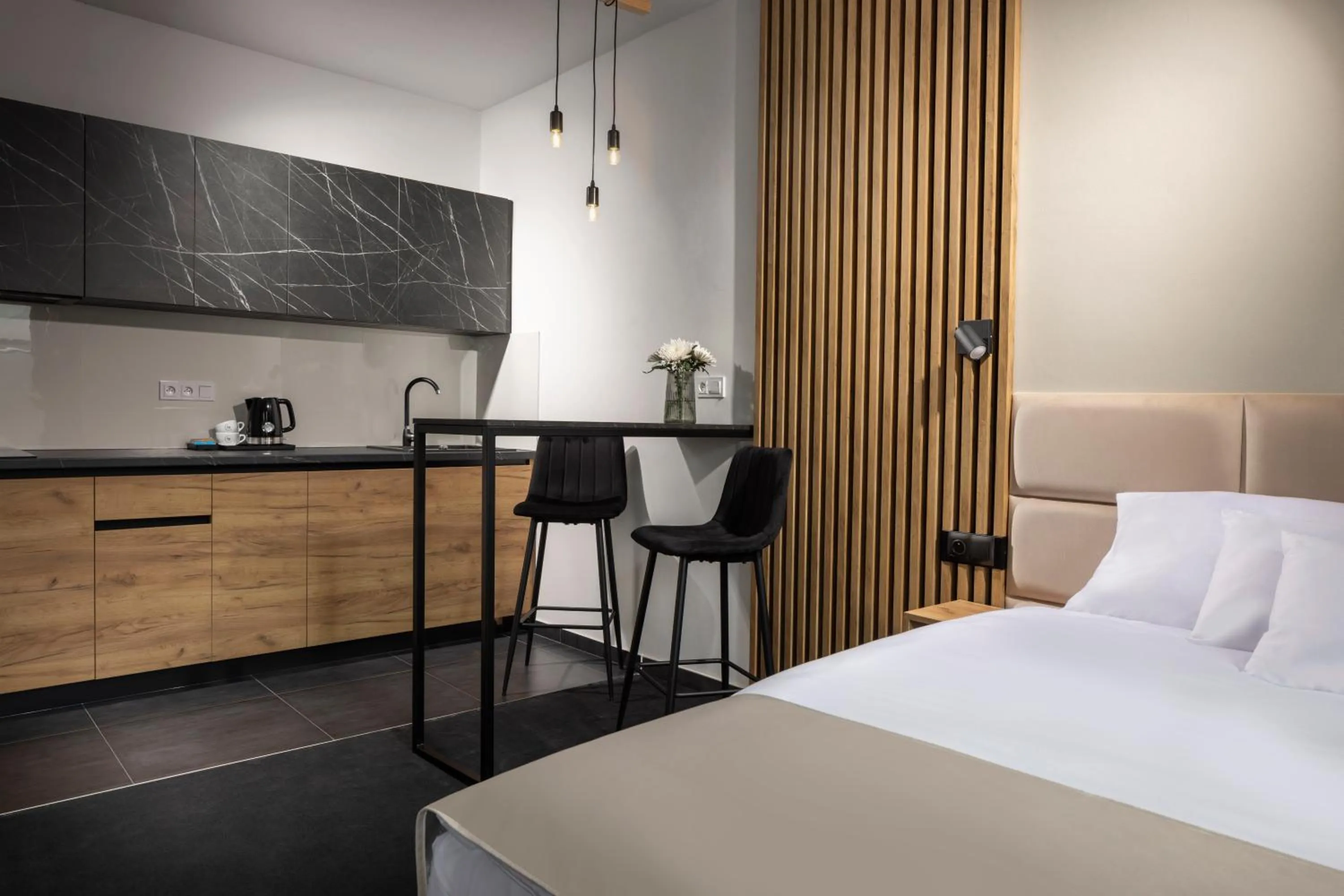 Kitchen or kitchenette, Bed in Hotel Savorsky