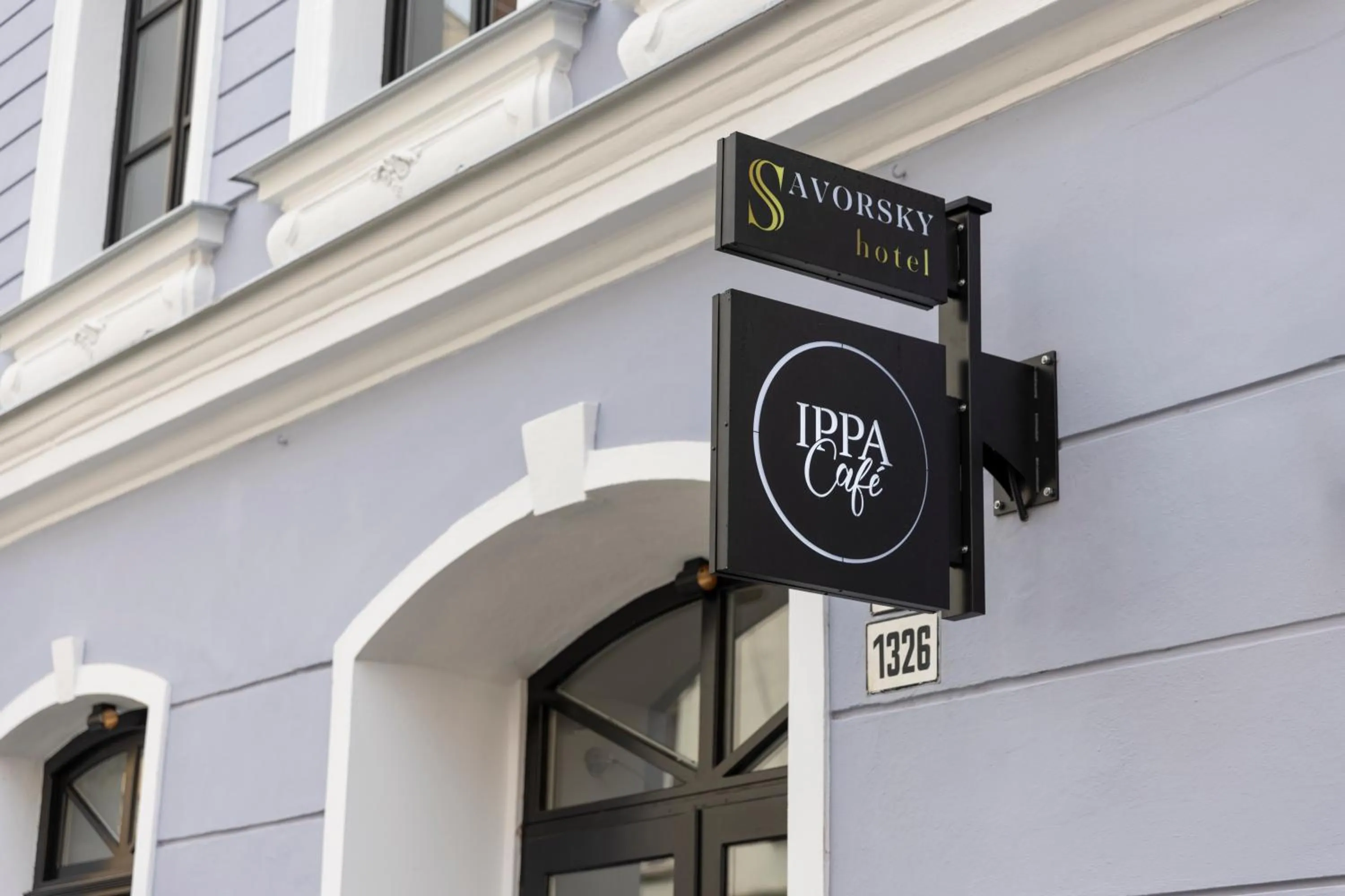 Property logo or sign in Hotel Savorsky