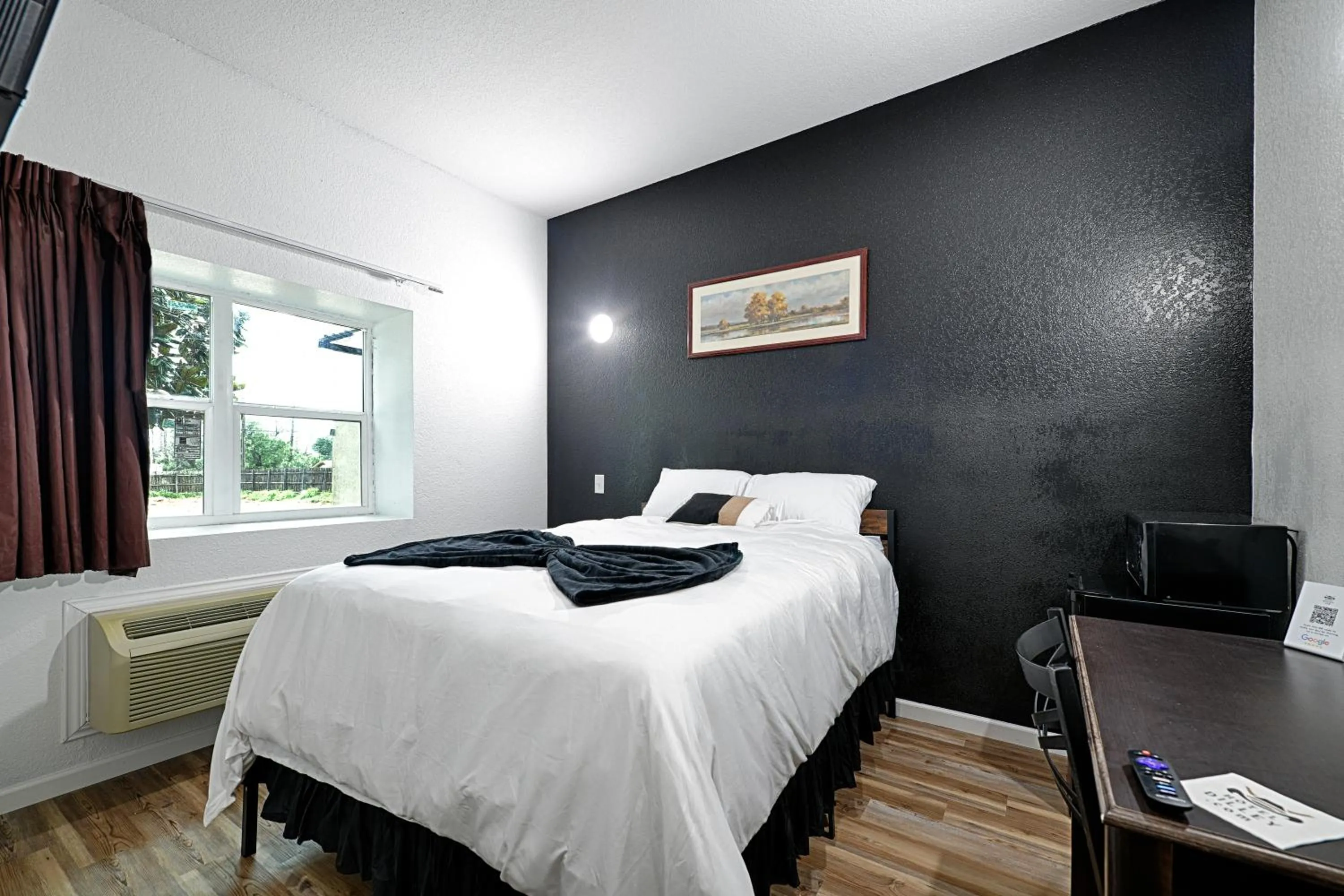 Bed in Hotel Dilley Grand