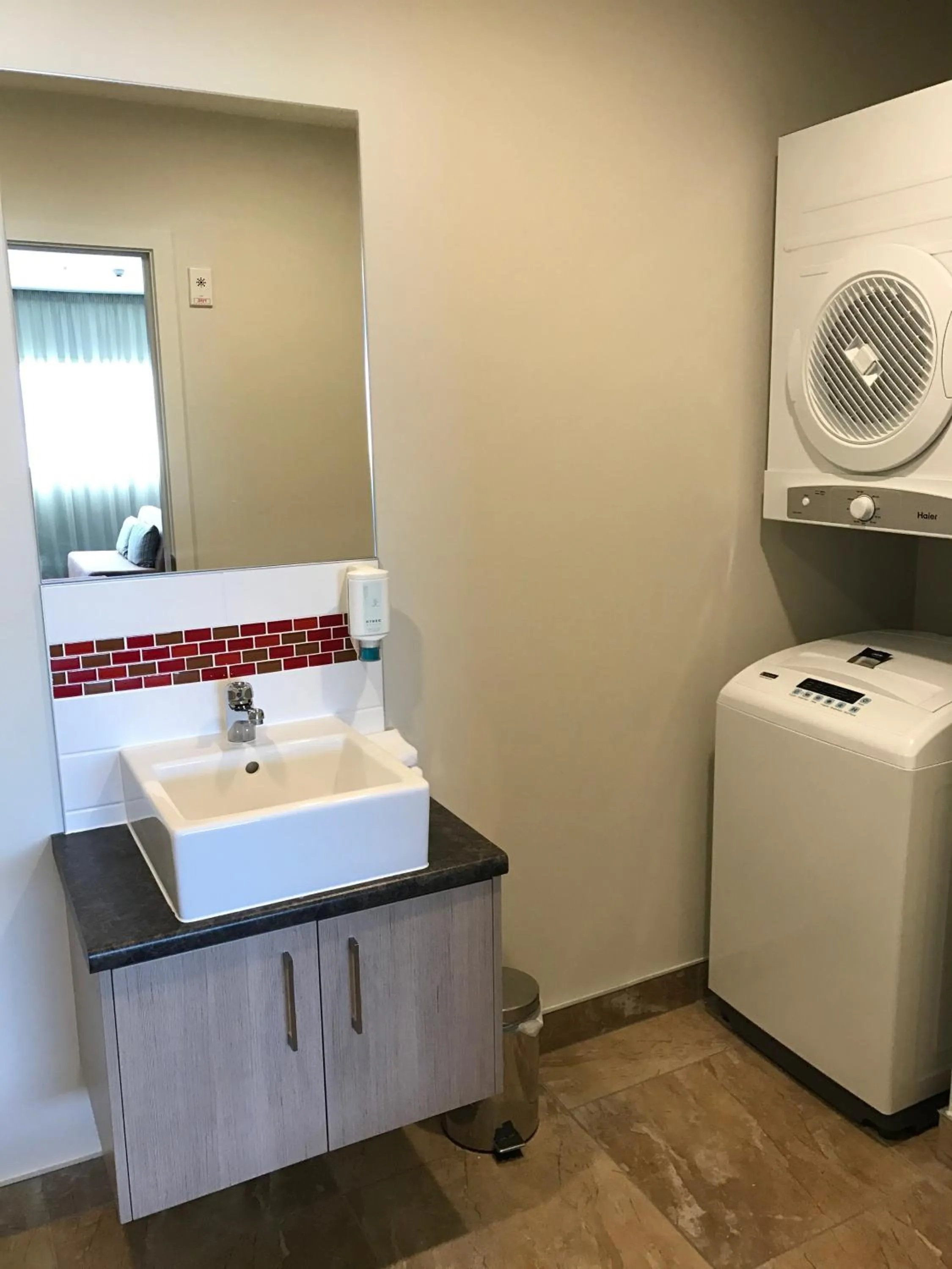 Bathroom in Ramada Suites by Wyndham Christchurch City