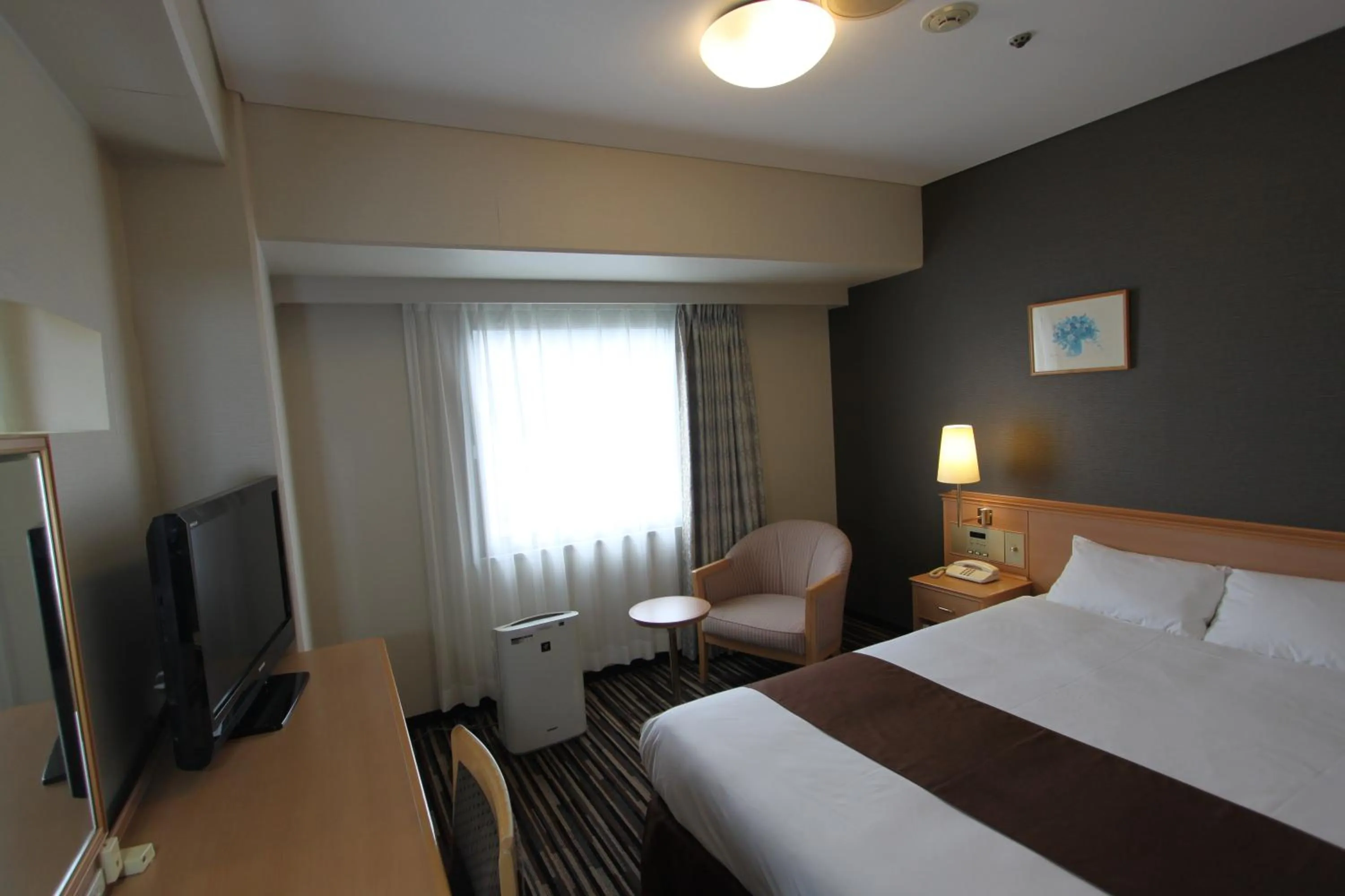 Photo of the whole room, Bed in Smile Hotel Tokushima