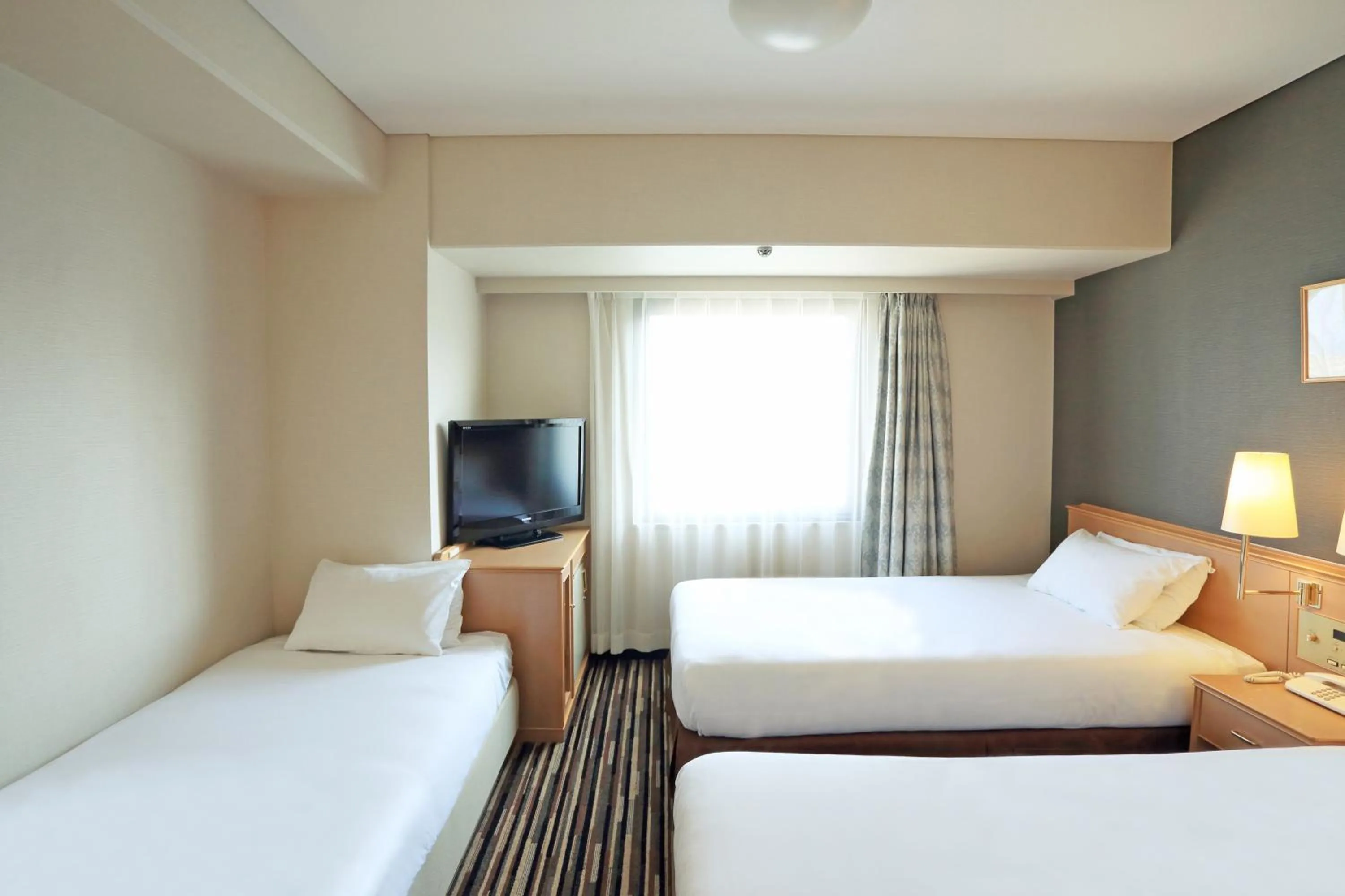 Photo of the whole room, Bed in Smile Hotel Tokushima