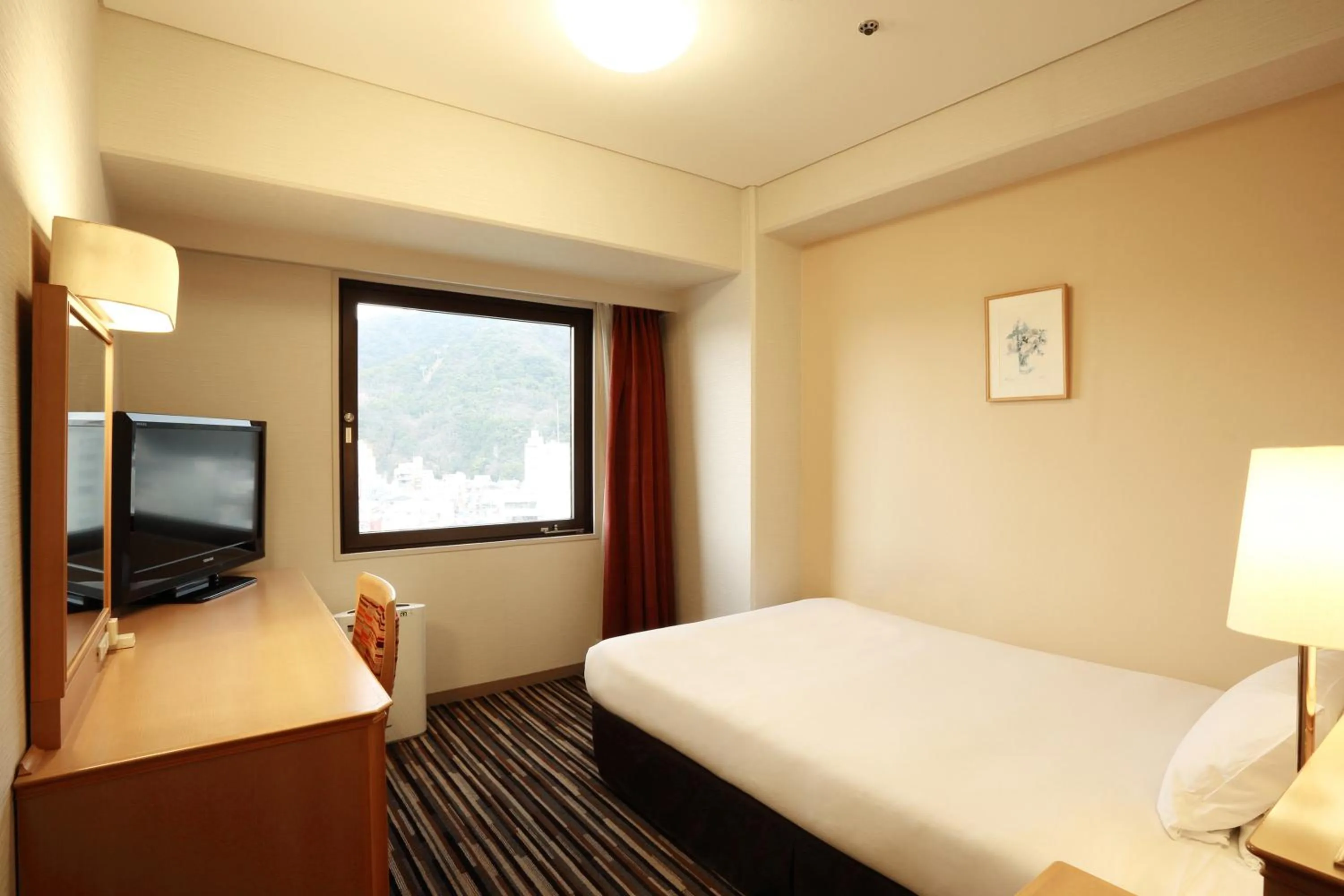 Photo of the whole room, Bed in Smile Hotel Tokushima