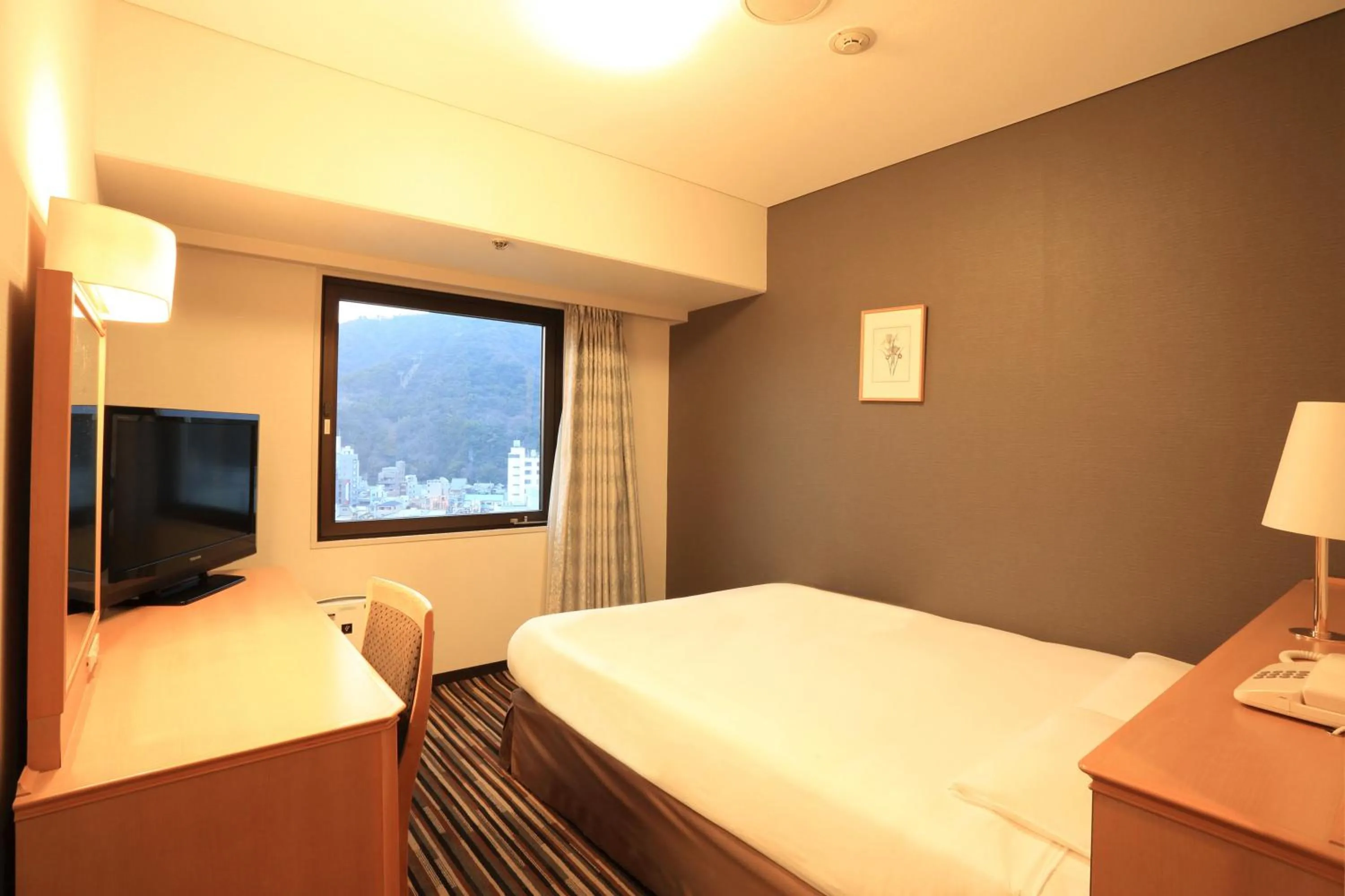 Photo of the whole room, Bed in Smile Hotel Tokushima