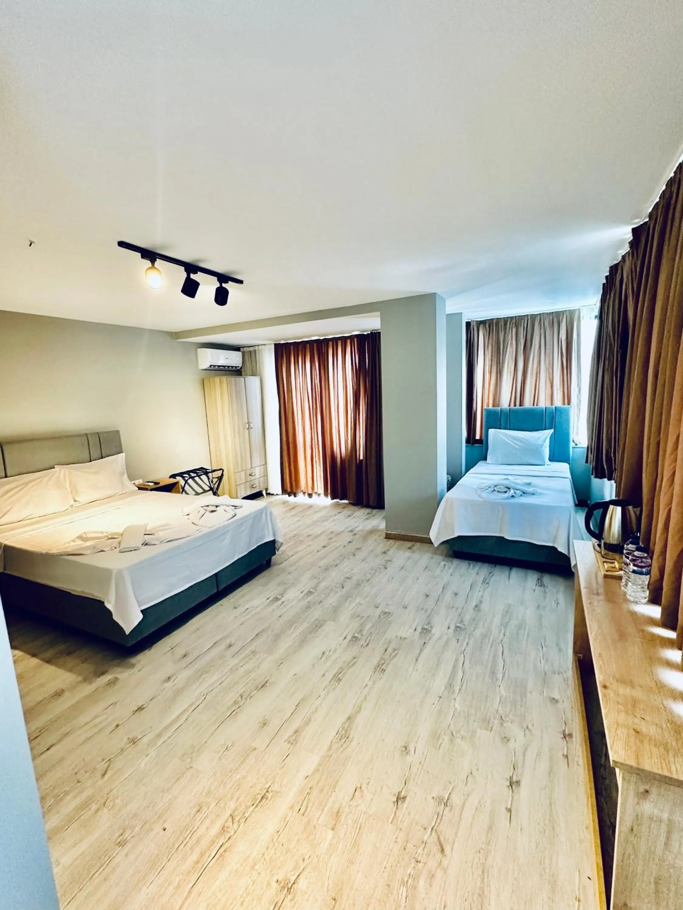 Bed in The Hera Gold Hotel