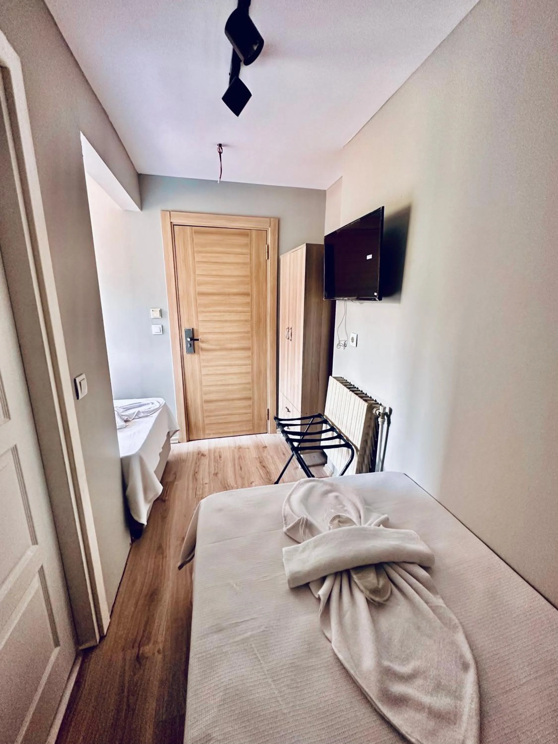 Bed in The Hera Gold Hotel