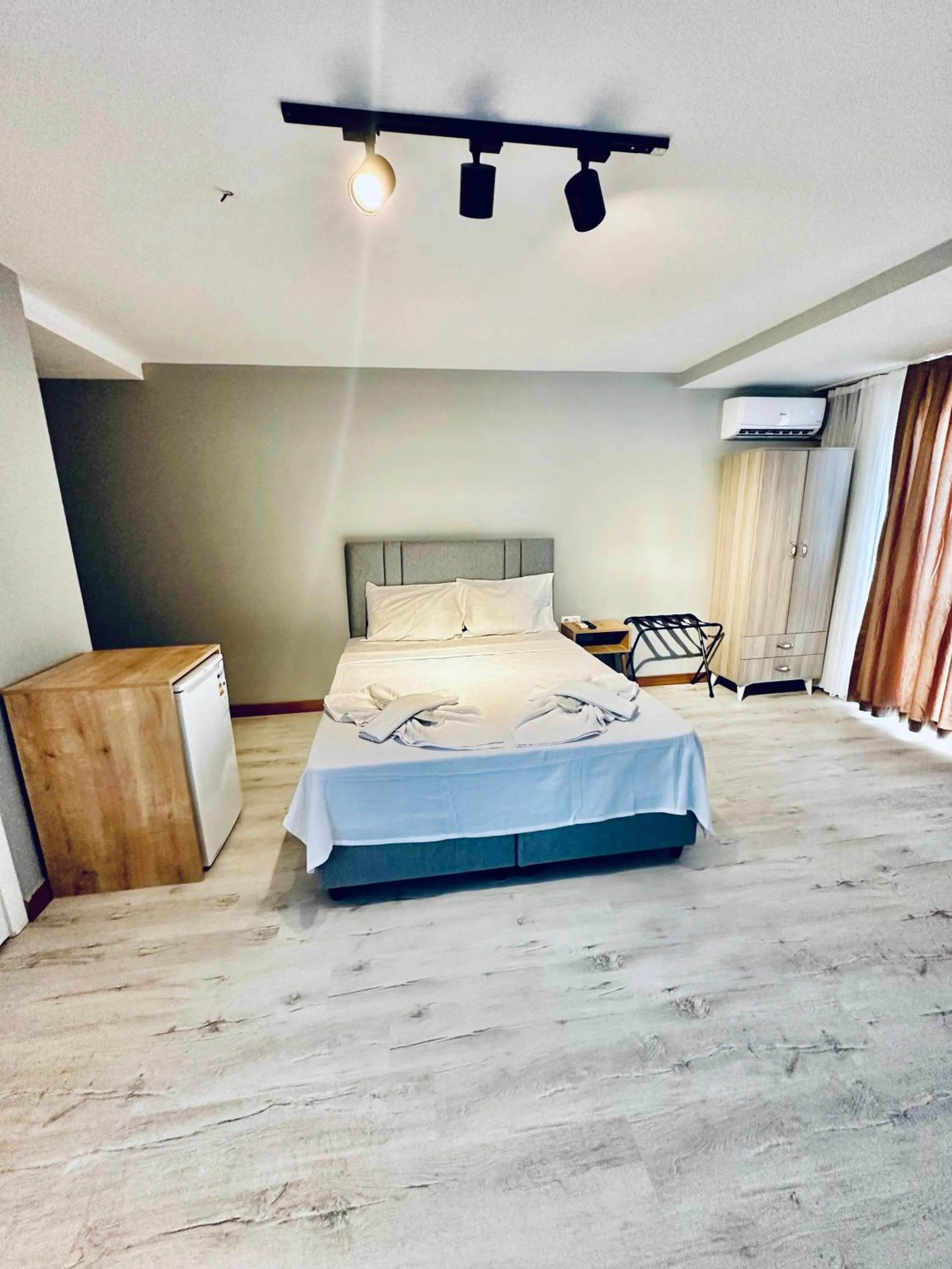 Bed in The Hera Gold Hotel