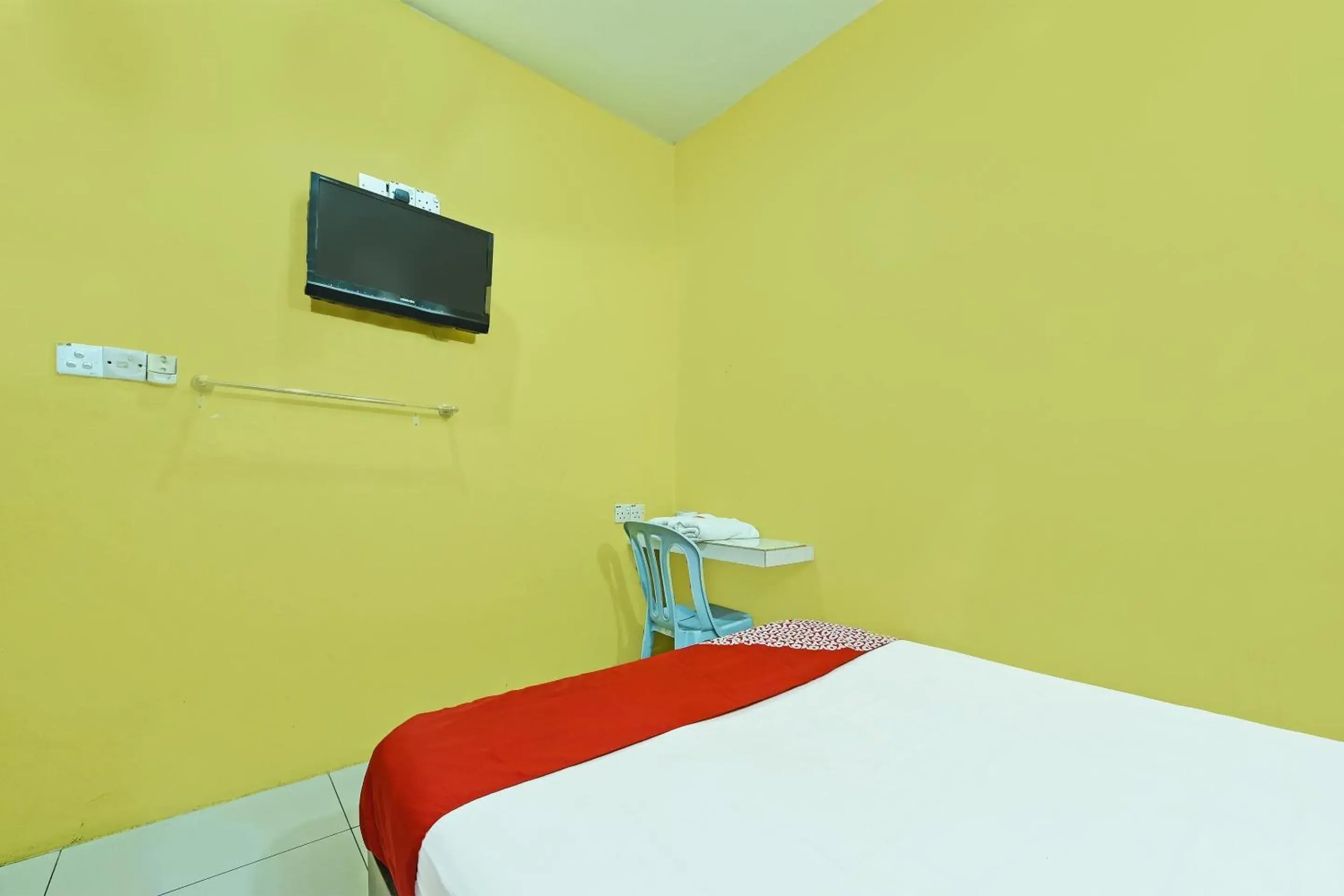 Bedroom in OYO 89656 Melati Hotel Nilai Bedroom in OYO 89656 Melati Hotel Nilai