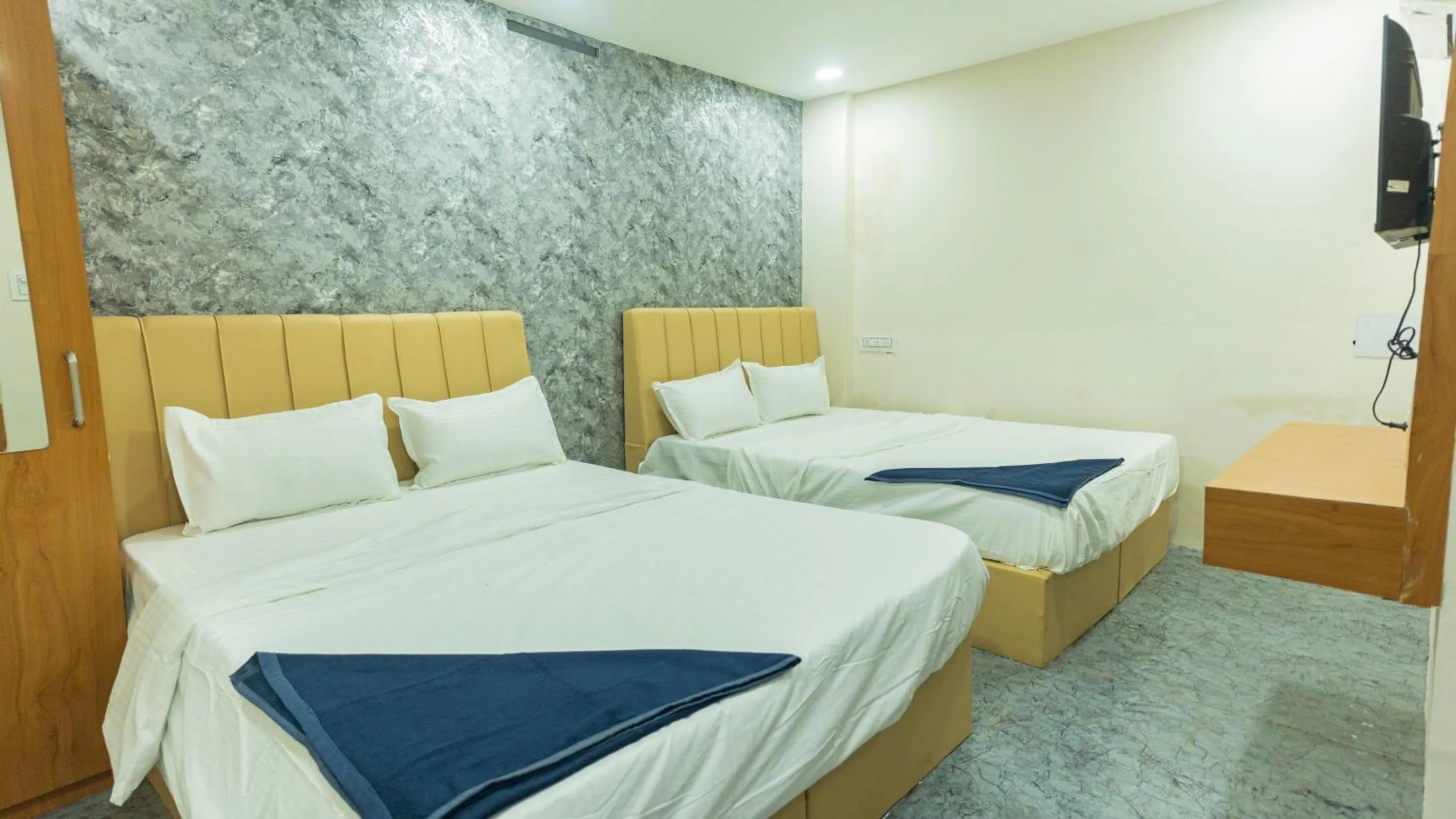 Bed in Hotel Mahakal Avantika Palace