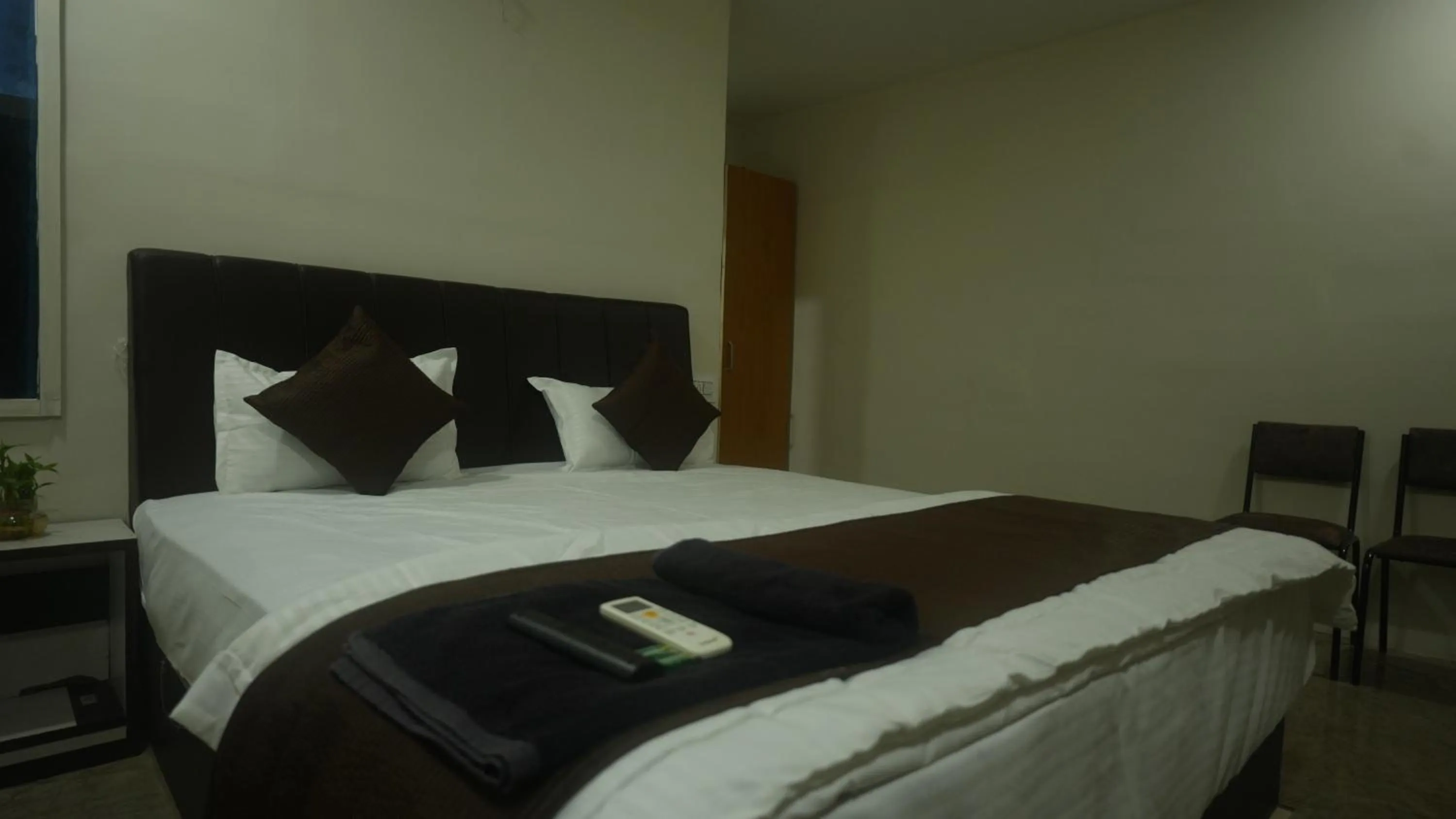 Bed in Hotel Mahakal Avantika Palace