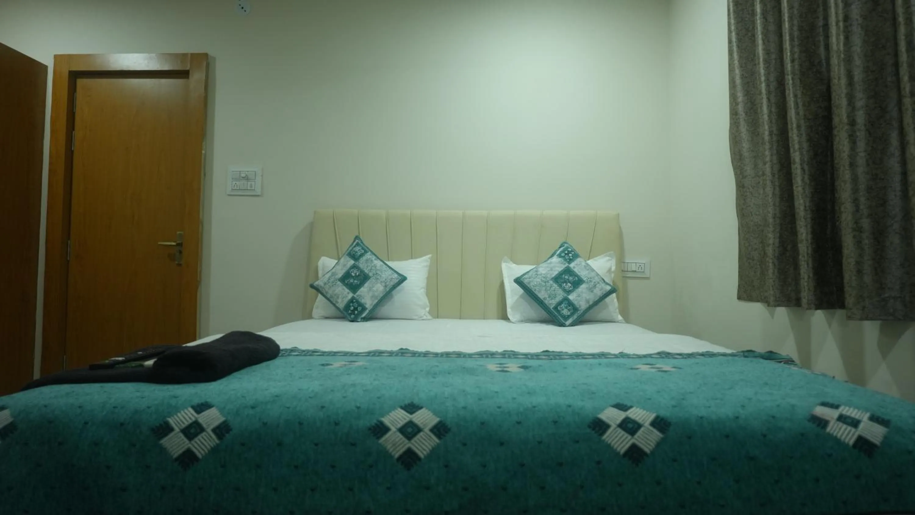 Bed in Hotel Mahakal Avantika Palace