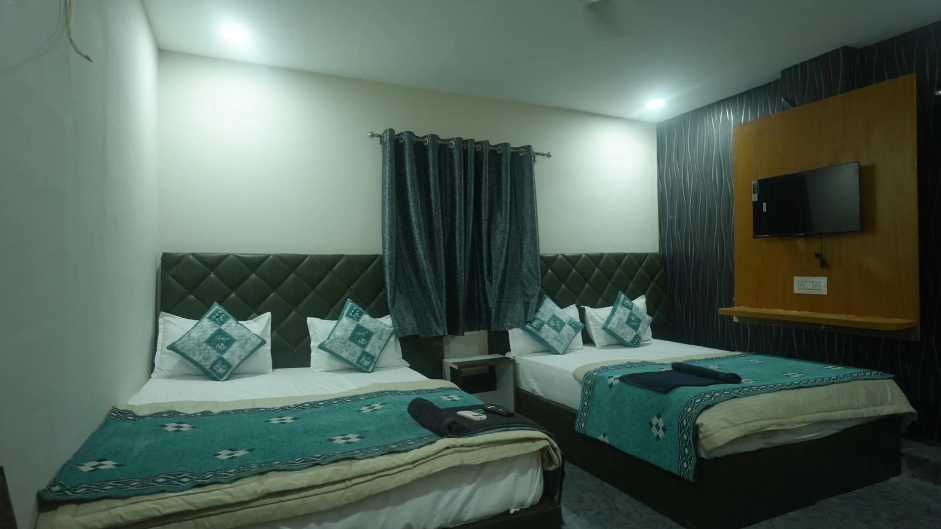 Bed in Hotel Mahakal Avantika Palace