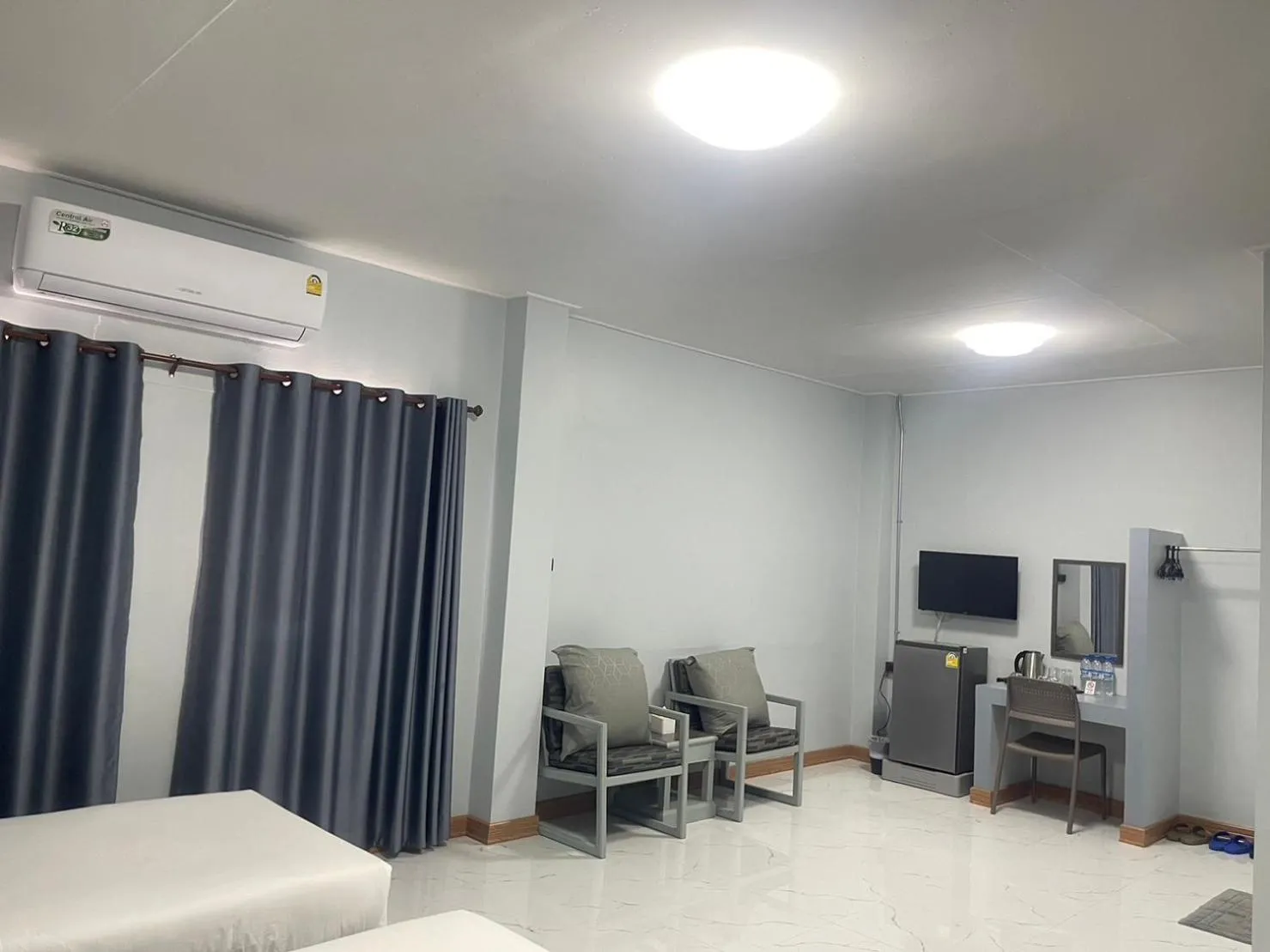 Living room, Bed in Chainatgrand Hotel