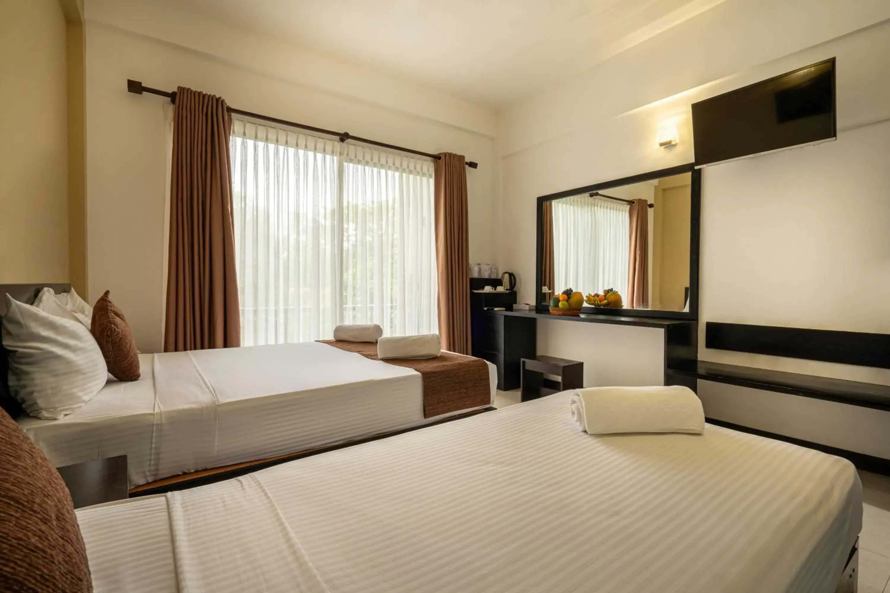 Deluxe Triple Room in Lavendish Tamarind Lifestyle Deluxe Triple Room in Lavendish Tamarind Lifestyle