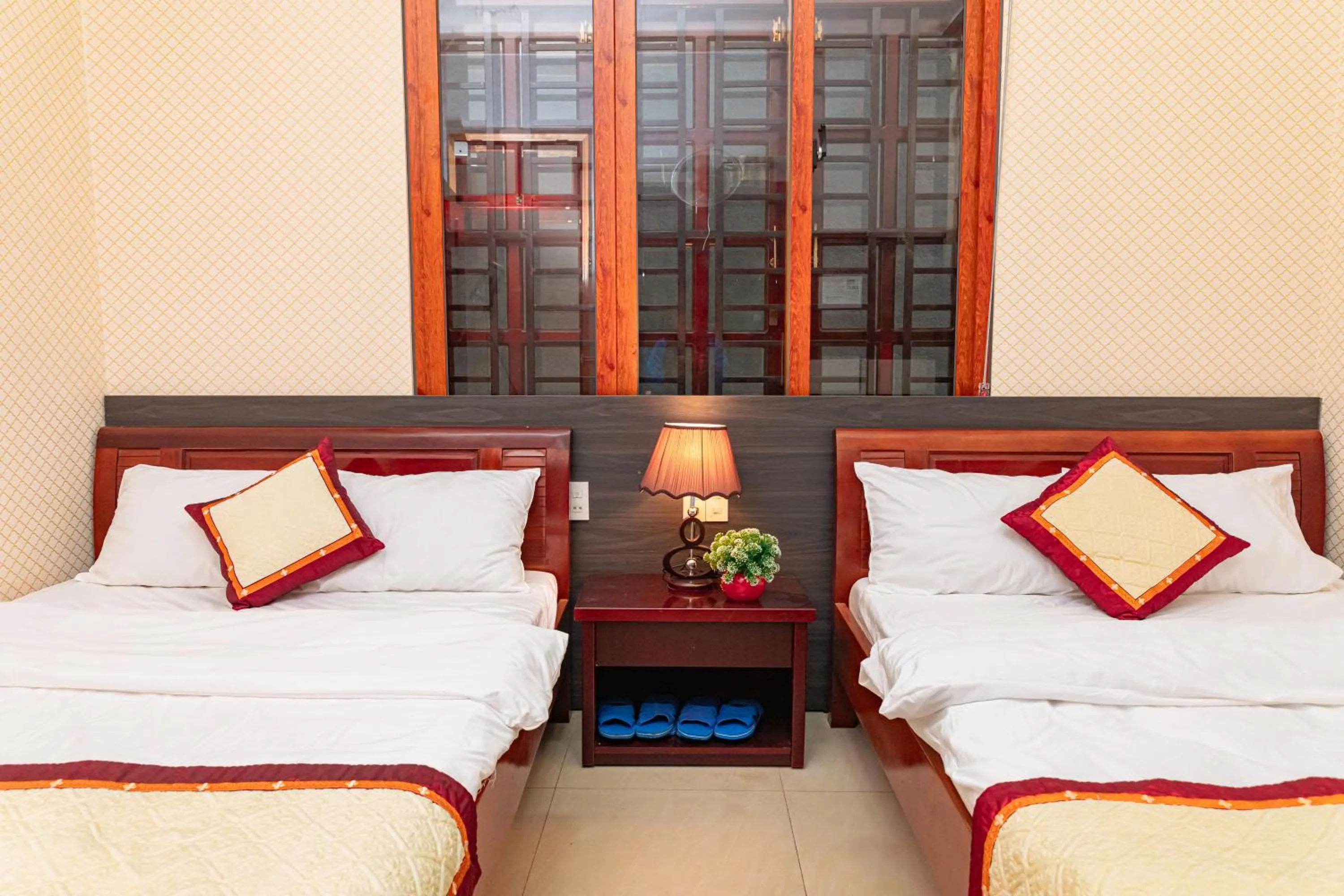 Bed in Hoang Long Hotel Da Lat City