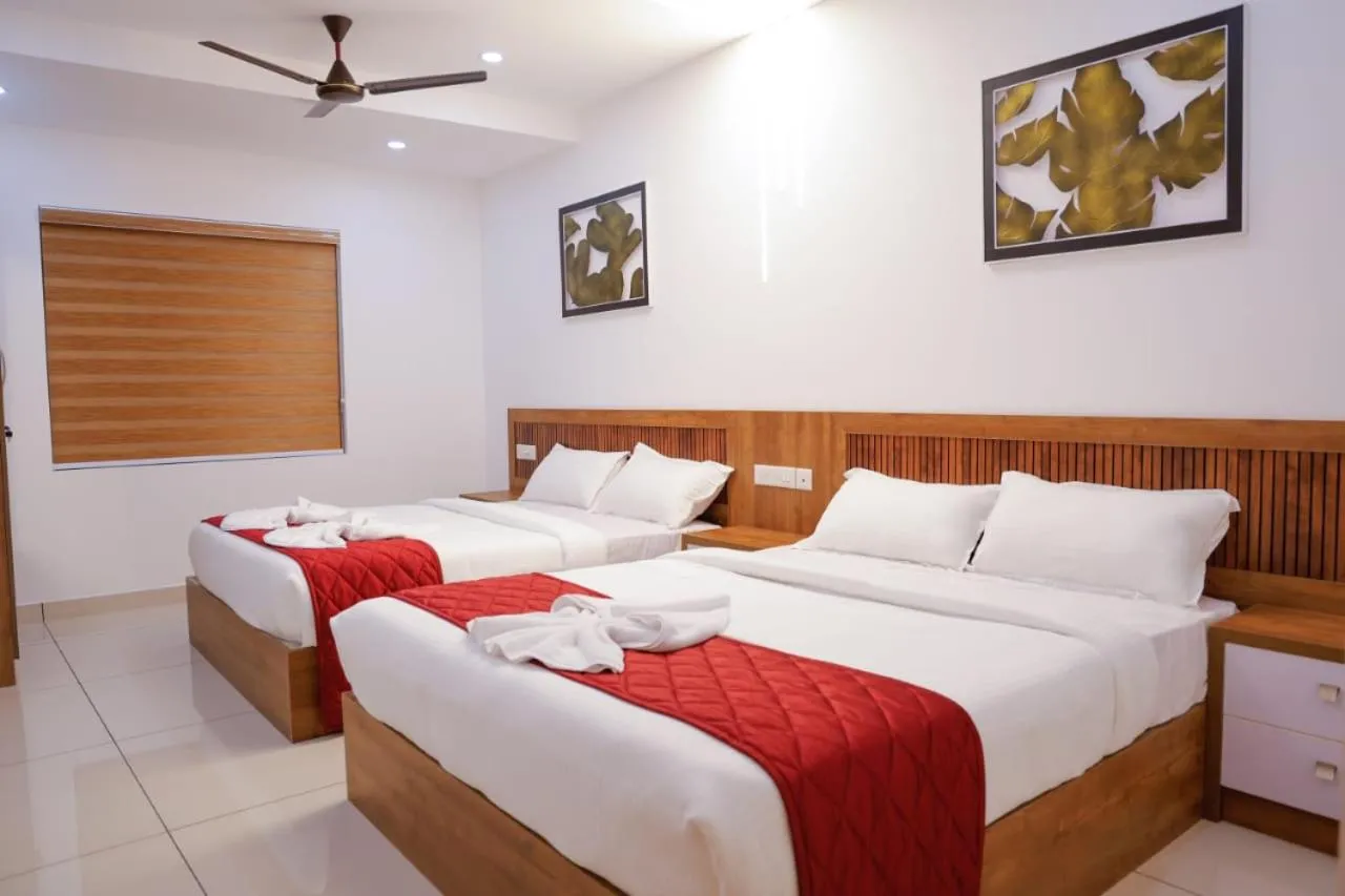 Quadruple Room in Coral Inn Residency