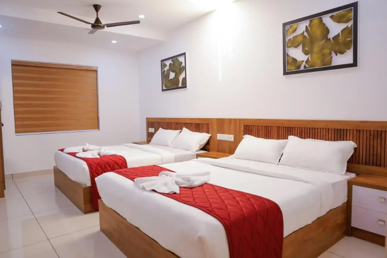 Quadruple Room in Coral Inn Residency Quadruple Room in Coral Inn Residency