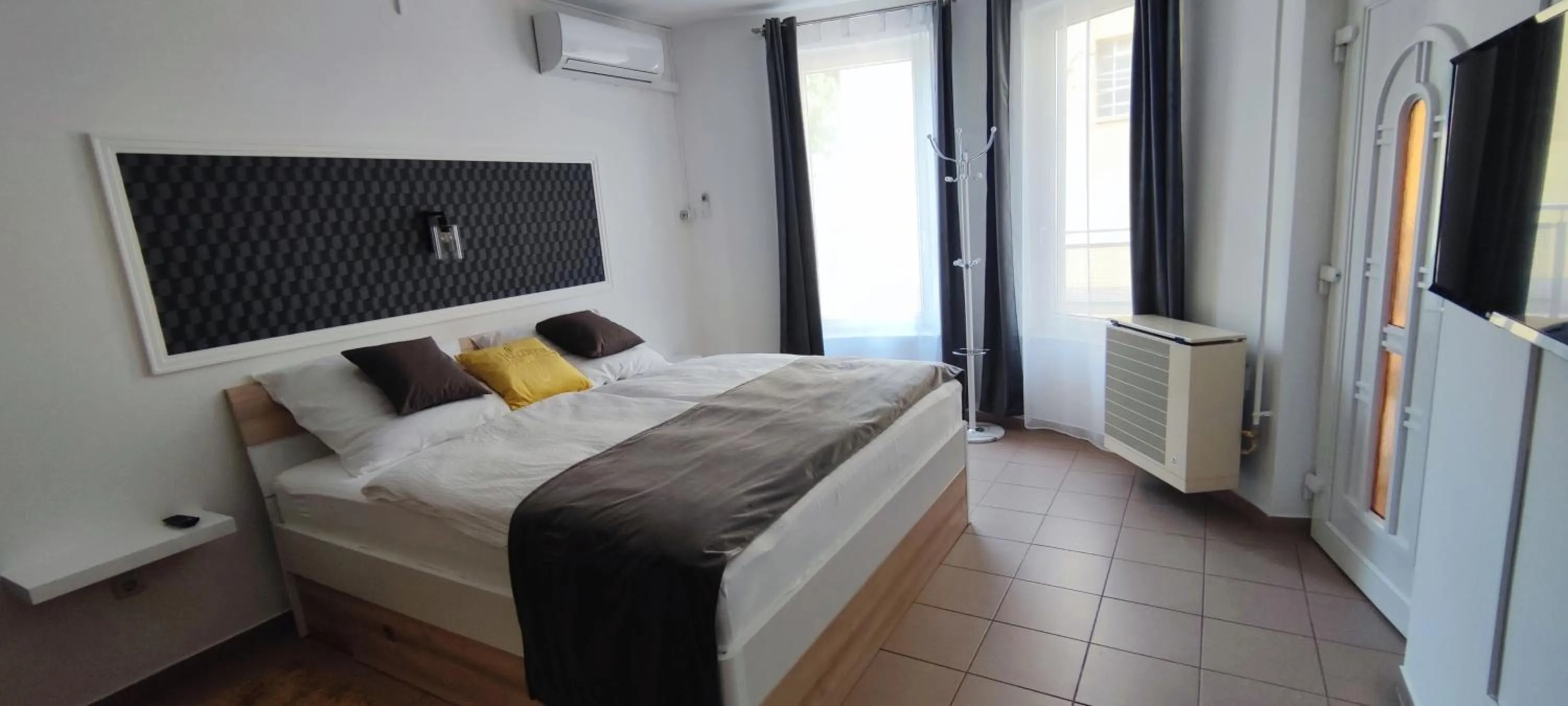 Bed in Nova Suites