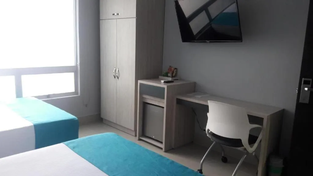 Bed in Hotel Lleras Express