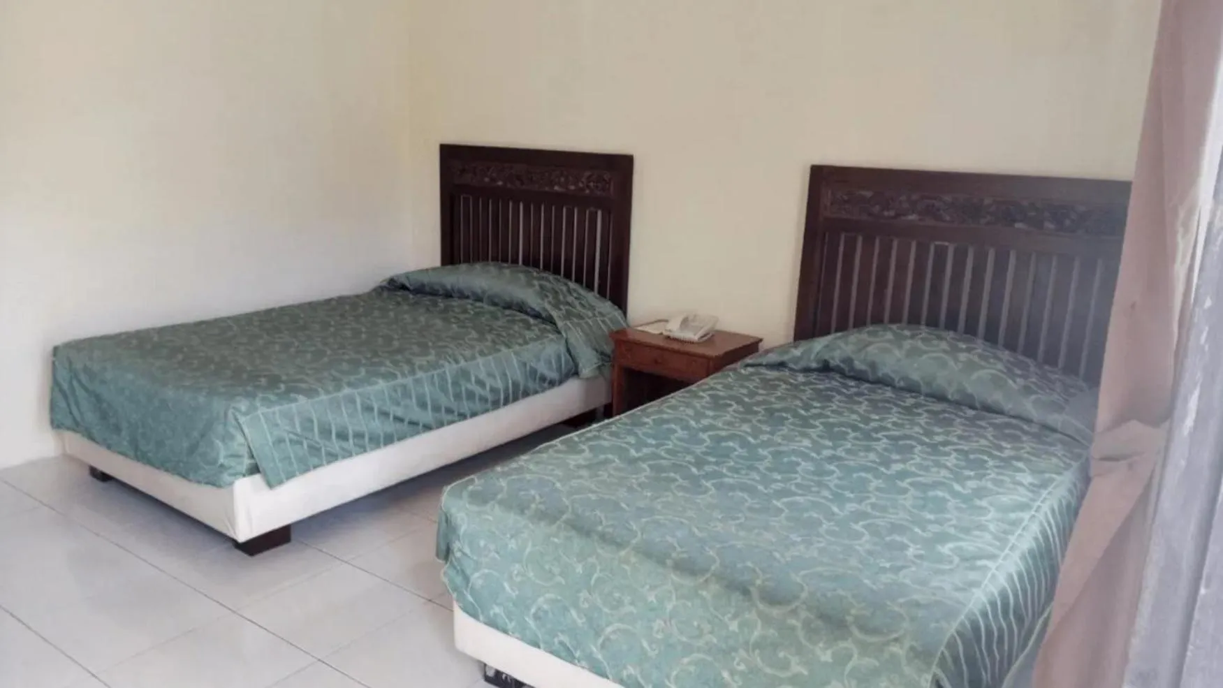 Bed in Resort Prima Sangkanhurip