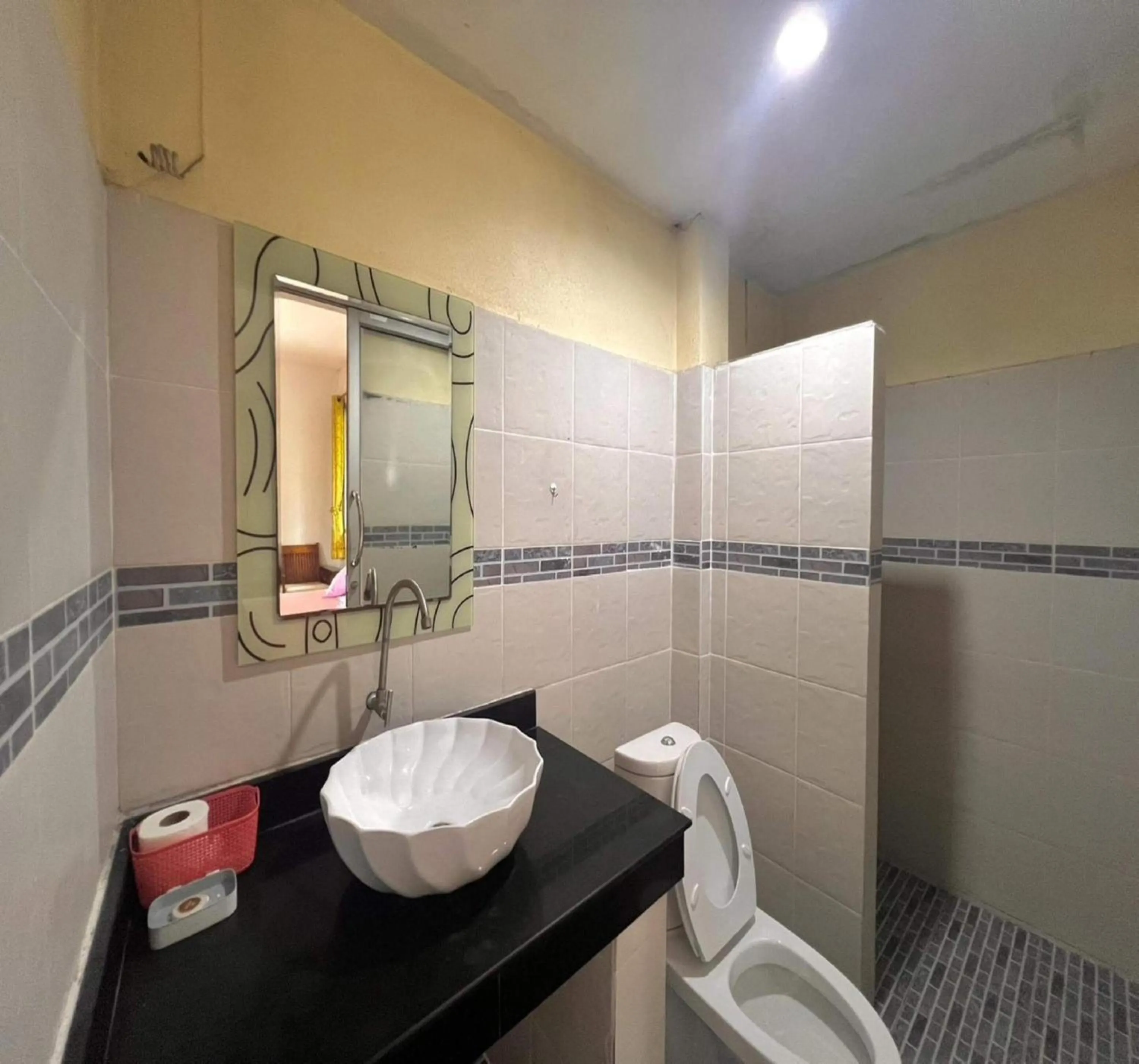 Bathroom in OYO 75517 Mananchaya Resort