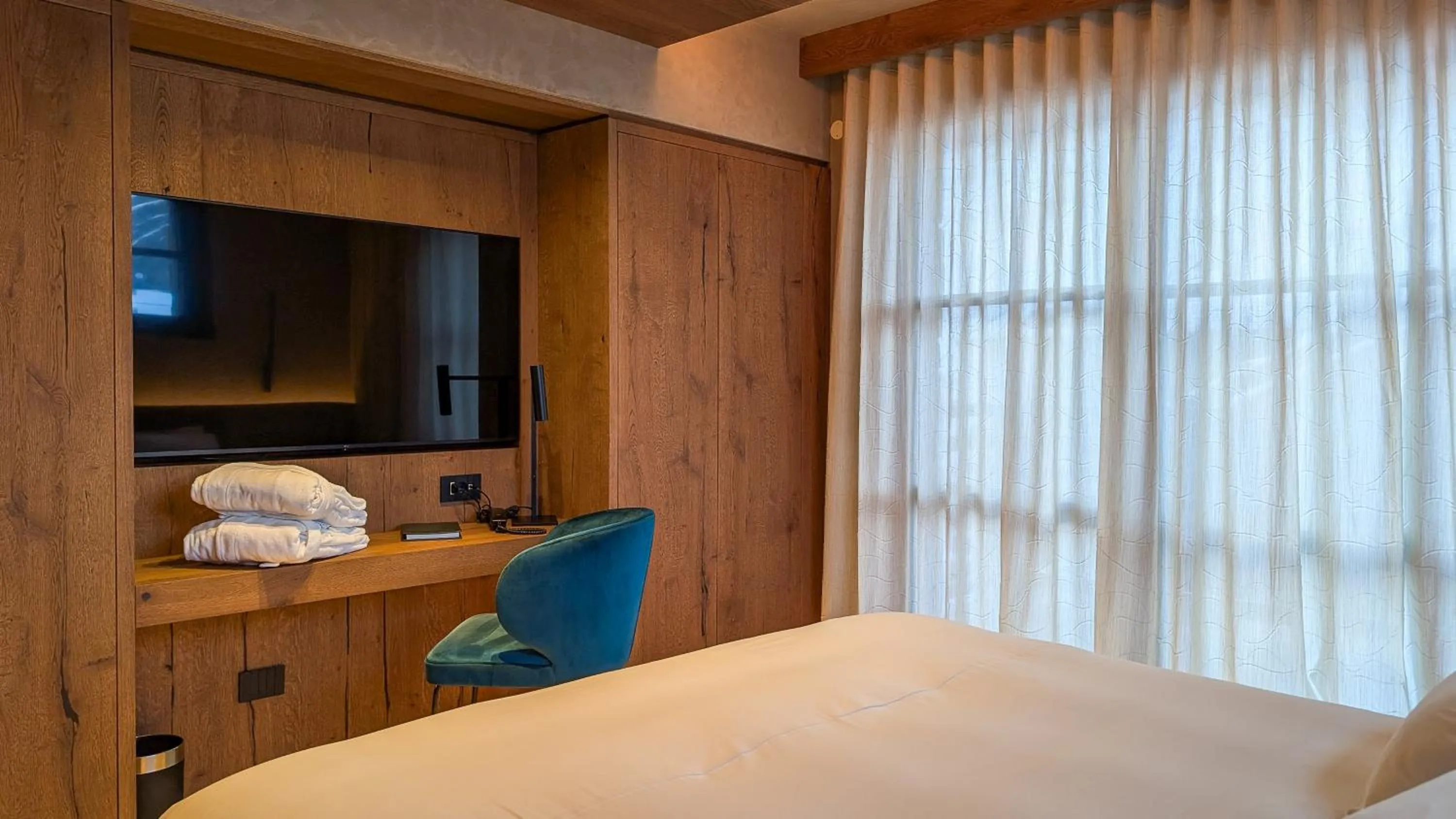 TV and multimedia, Bed in Mohe Boutique Hotel