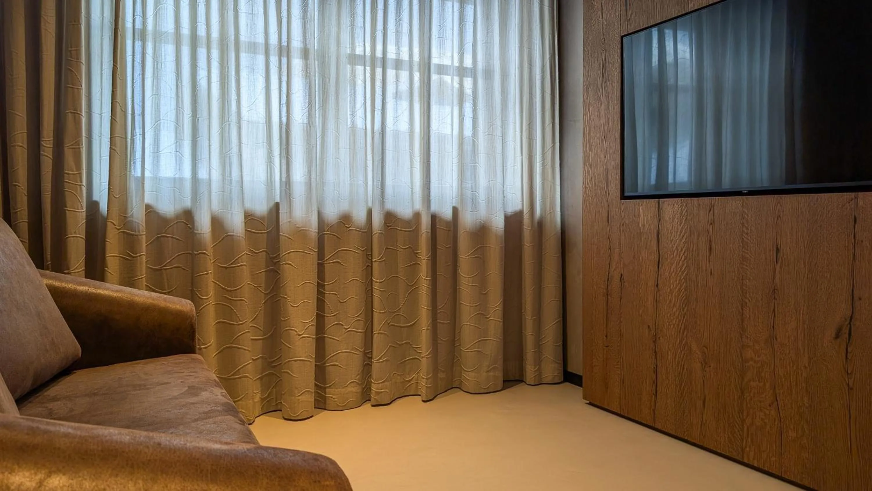 TV and multimedia in Mohe Boutique Hotel