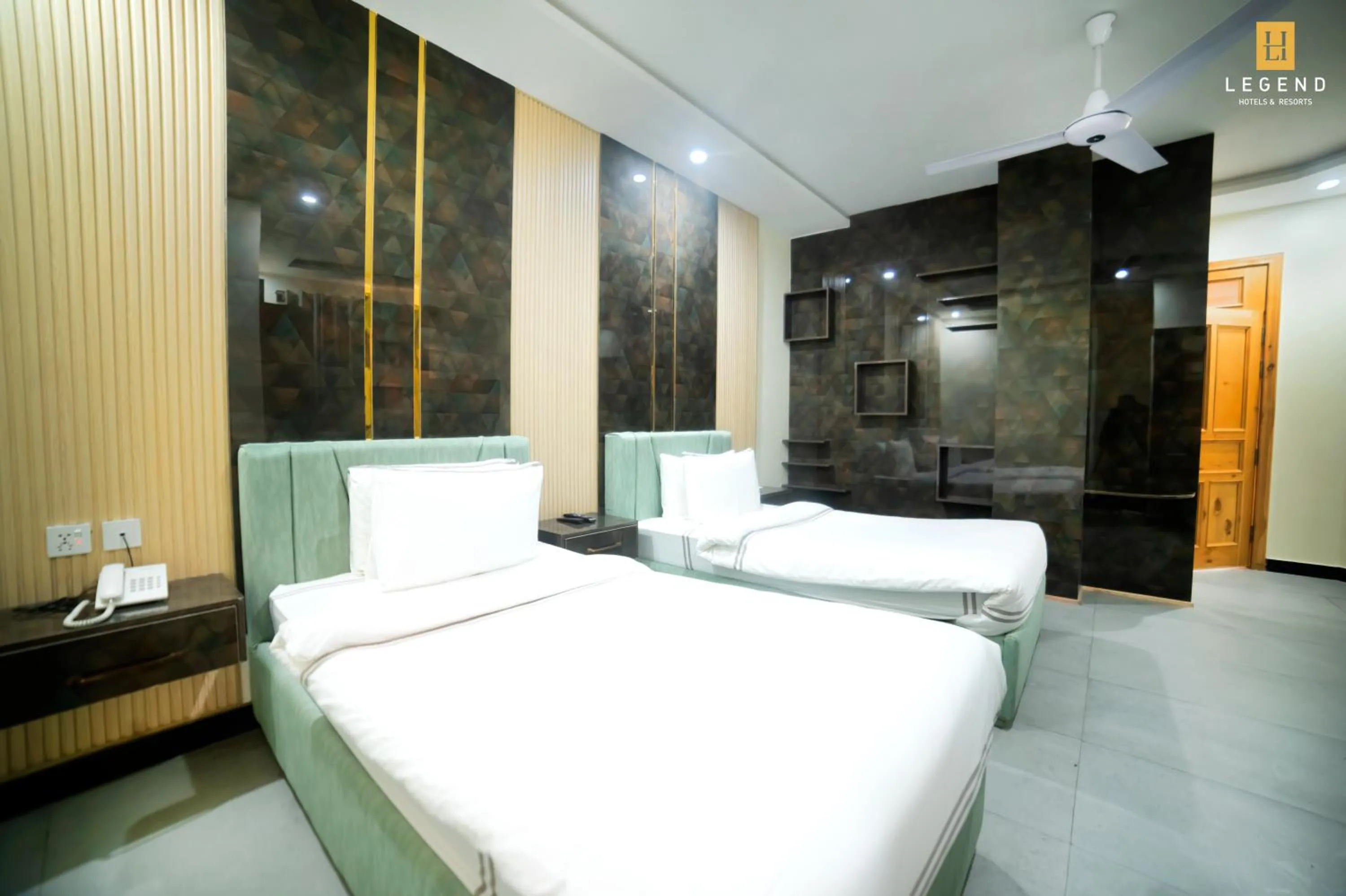 Bed in Legend Hotel Kalam