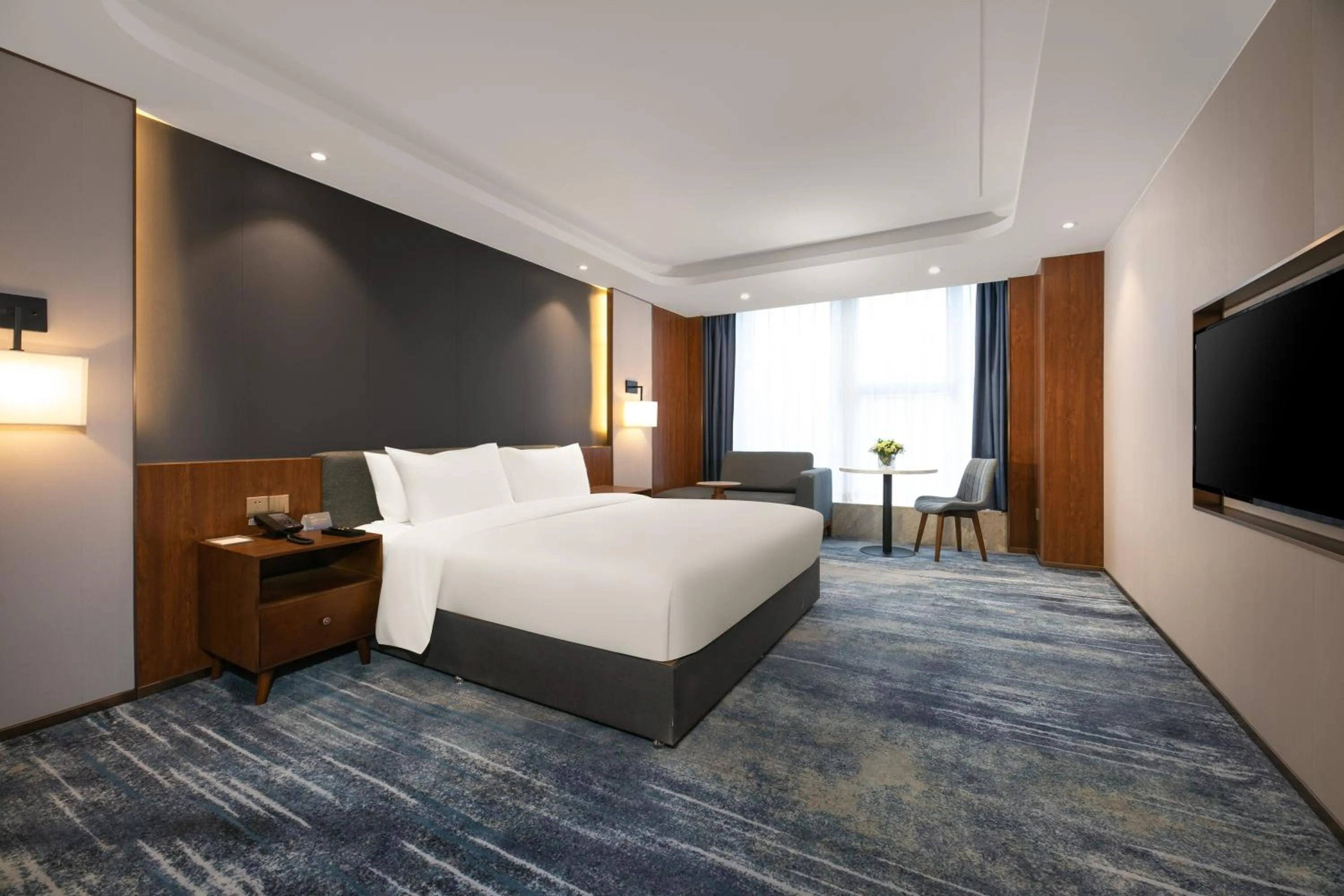 Bed in Furunde Wanda Jin Hotel