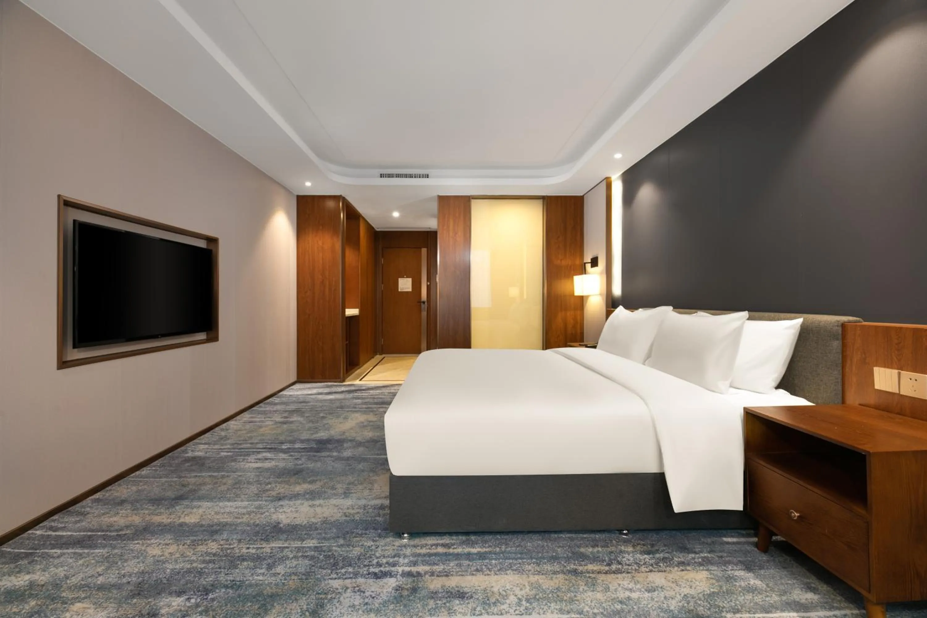 Bed in Furunde Wanda Jin Hotel