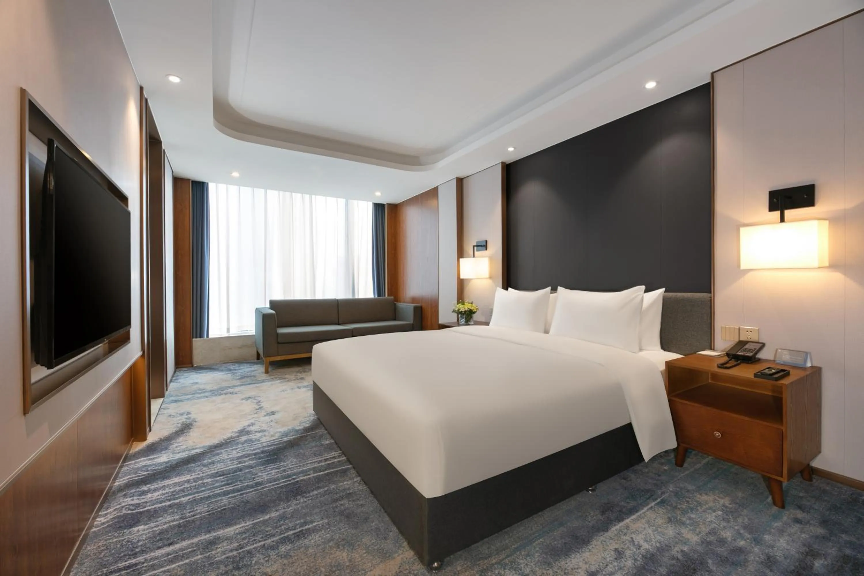 Bed in Furunde Wanda Jin Hotel