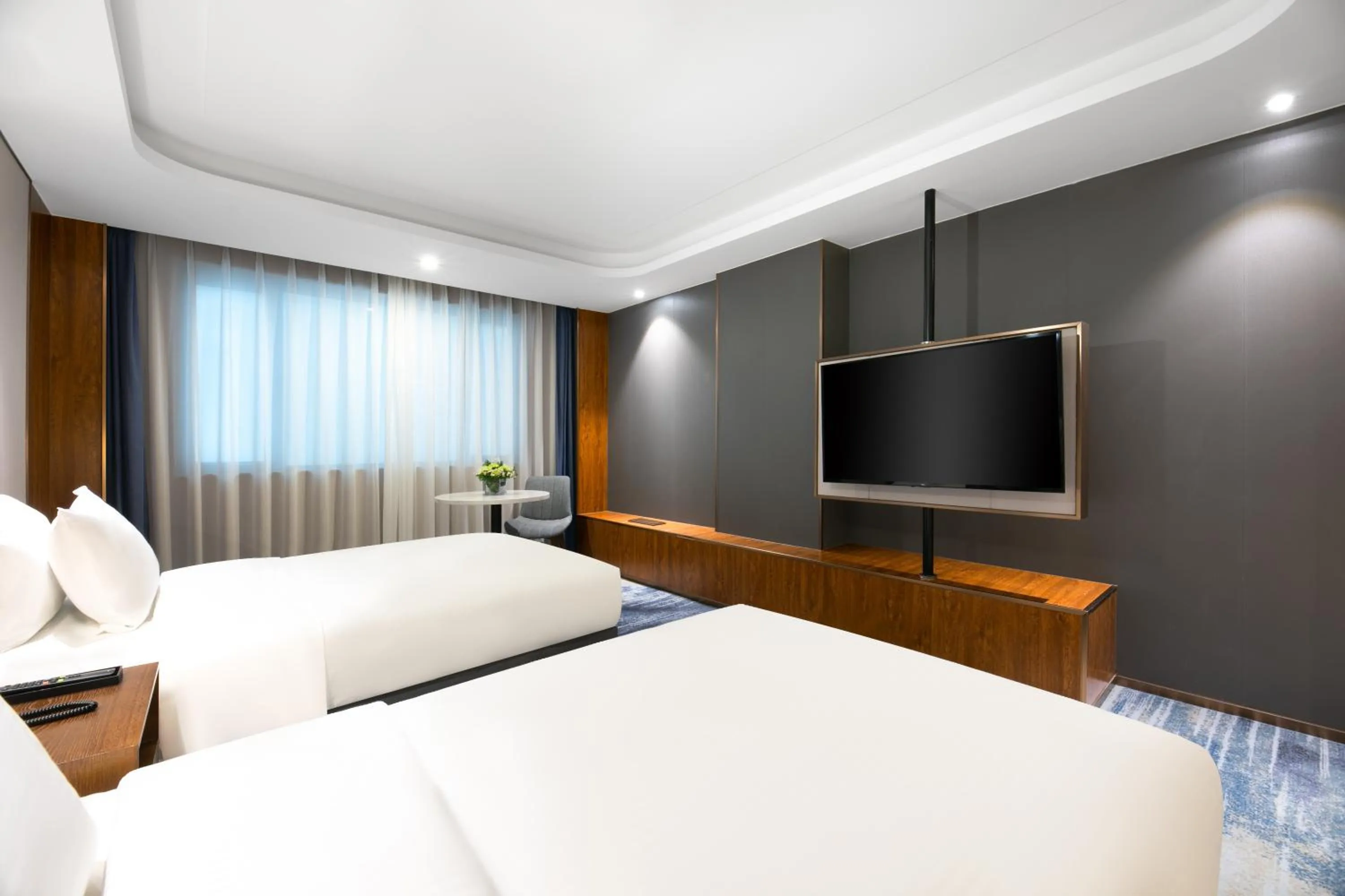 Bed in Furunde Wanda Jin Hotel