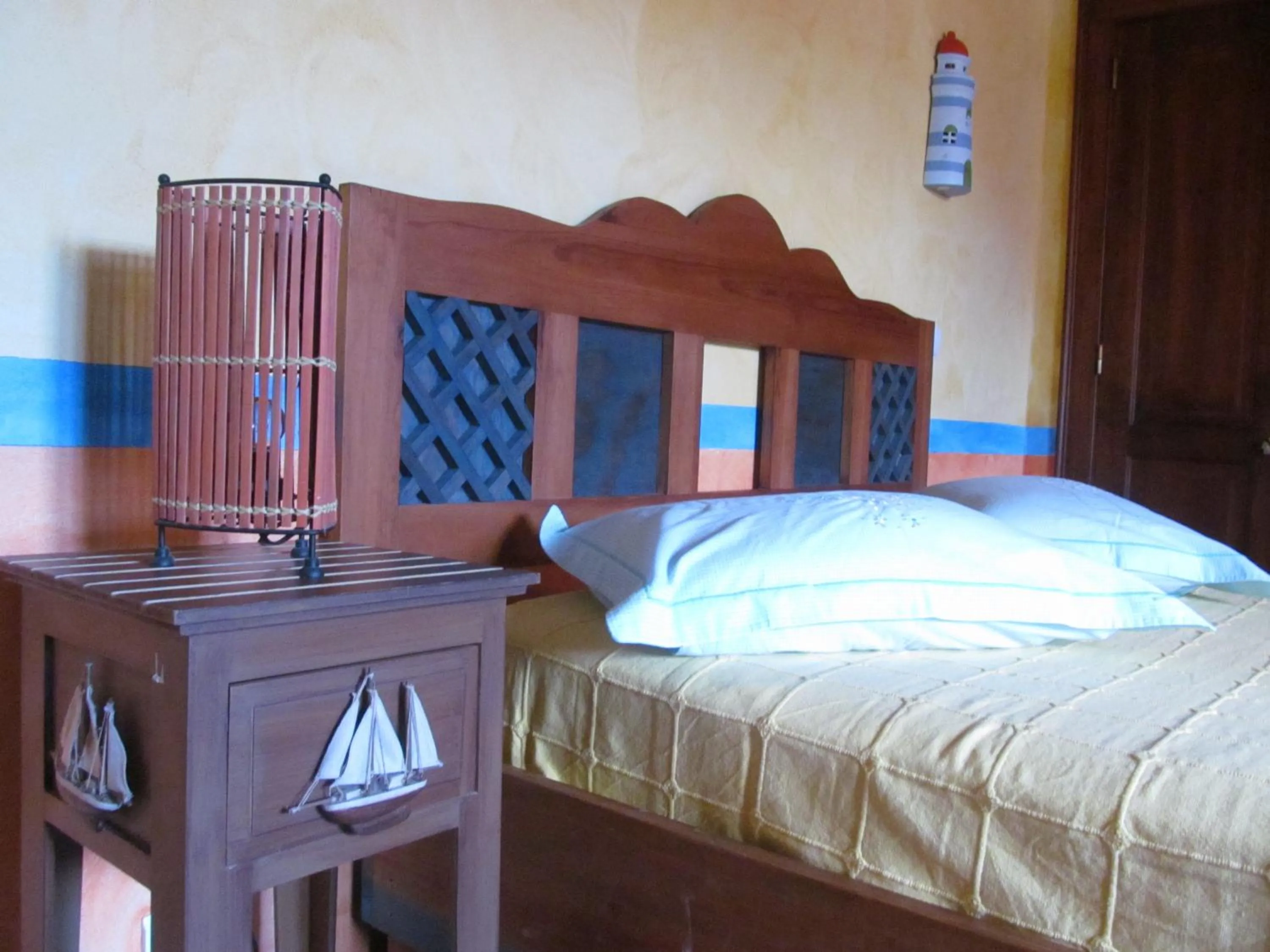 Bed in Golf & Surf Holiday House