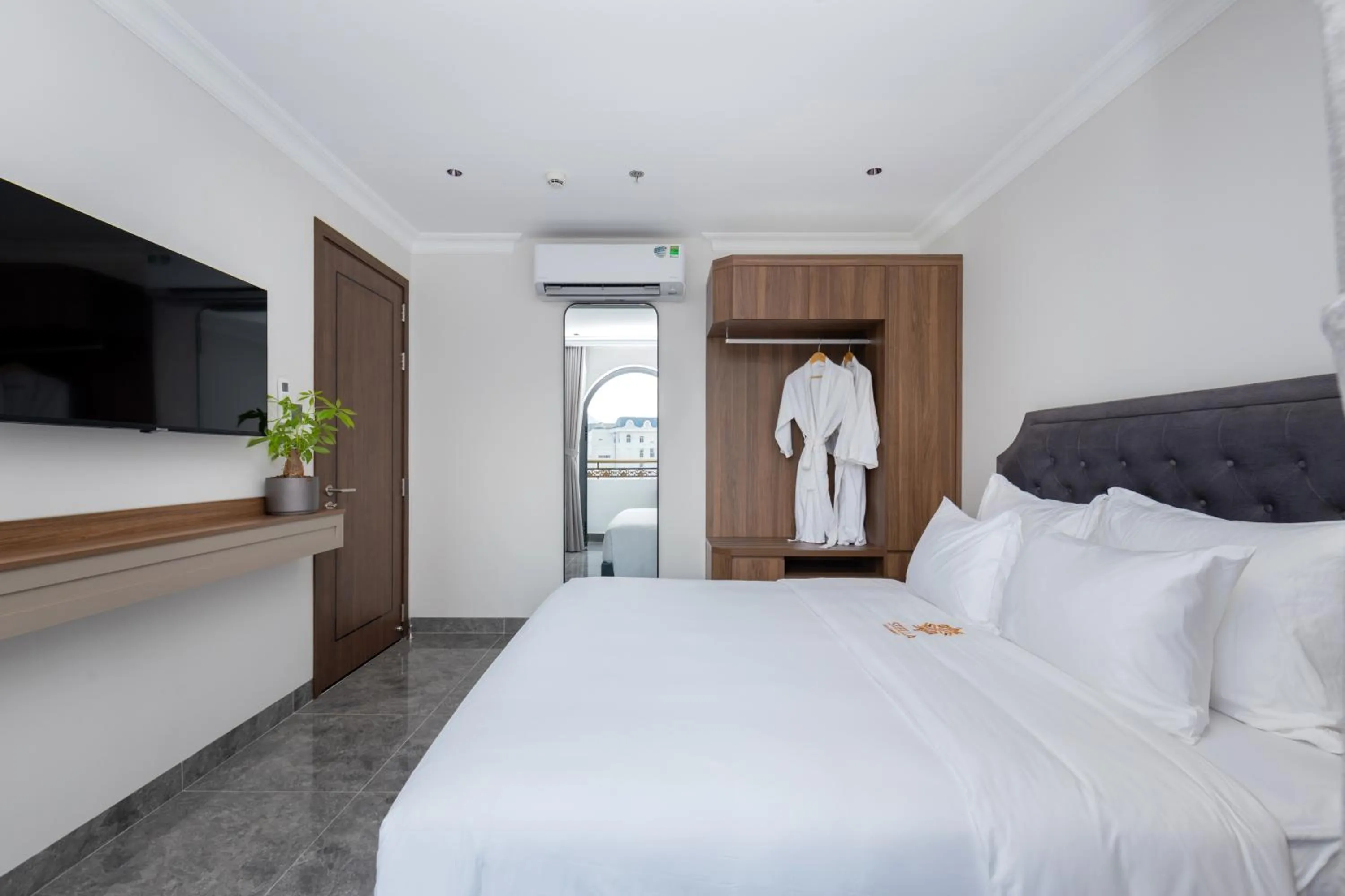 Bedroom, Bed in STELLA Hotel & Apartment