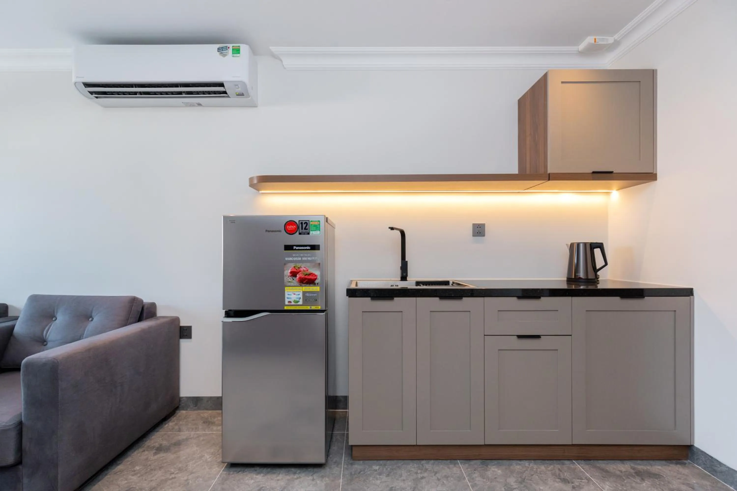 Kitchen or kitchenette in STELLA Hotel & Apartment